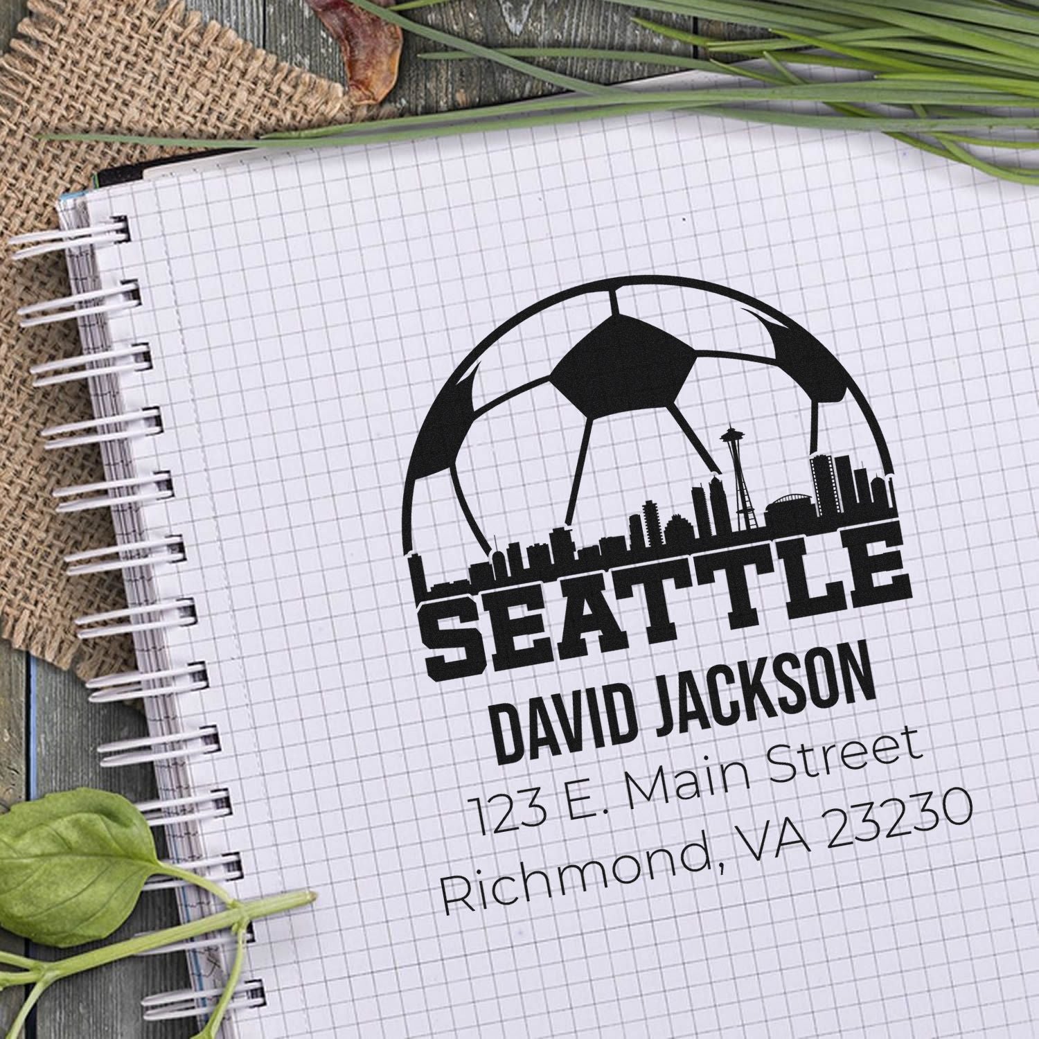 Custom Seattle soccer return address rubber stamp with skyline logo, name, and address for personalized stationery.