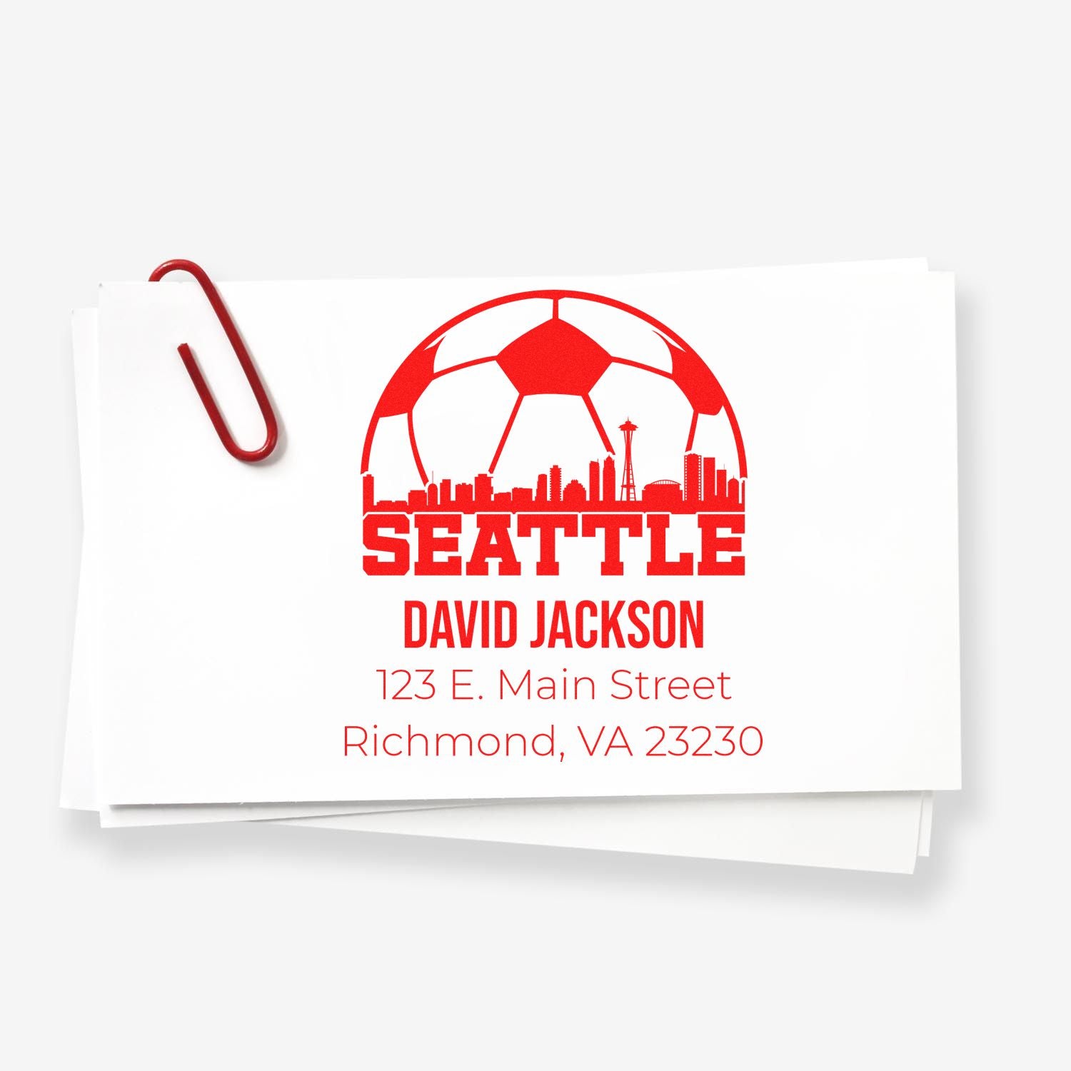 Custom Seattle address rubber stamp with skyline logo, name, and Richmond, VA mailing address.