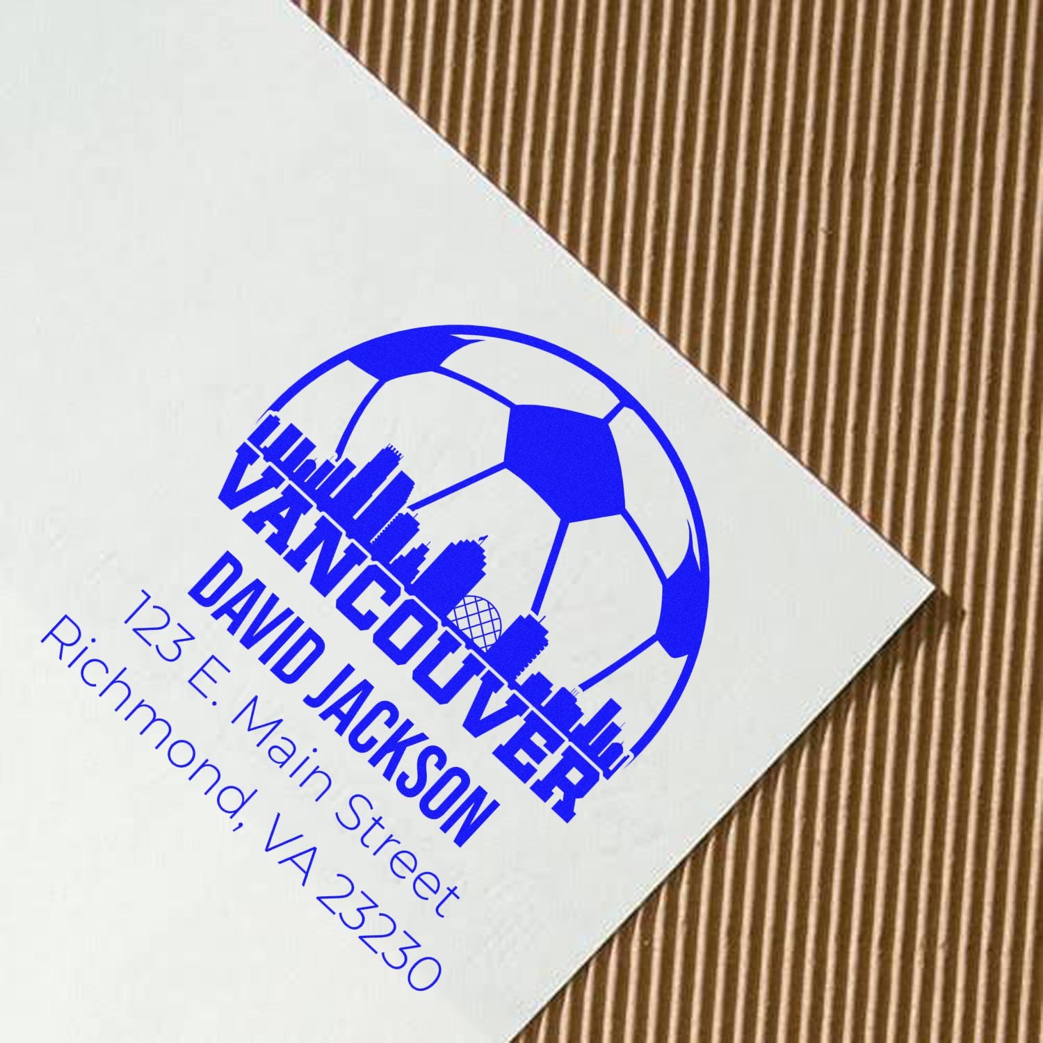 Custom rubber address stamp with Vancouver soccer logo, David Jackson name, and Richmond, VA 23230 mailing details.