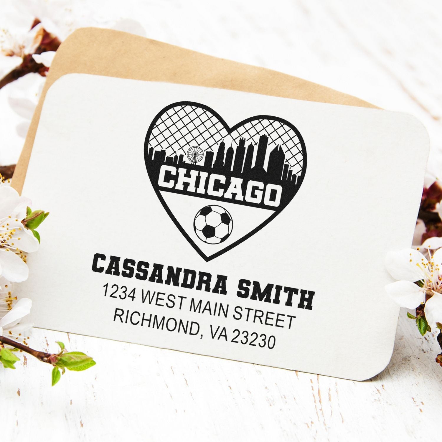 Custom rubber stamp design with Chicago skyline heart, soccer ball, and personalized return address for Cassandra Smith.
