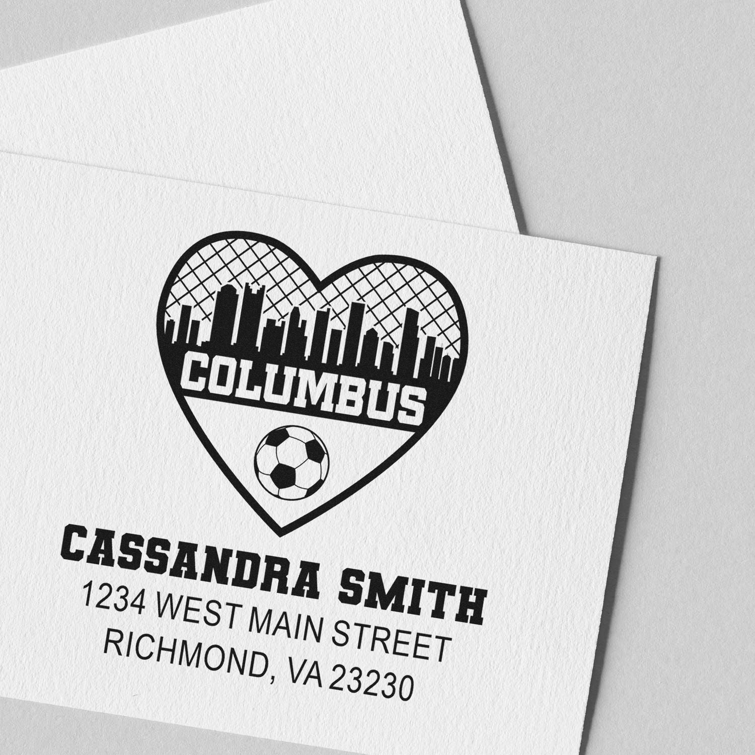 Custom rubber stamp return address design with Columbus heart soccer logo for Cassandra Smith, Richmond, VA.