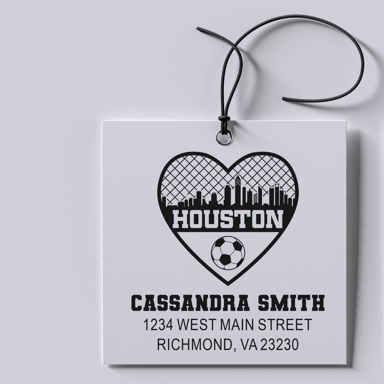 Custom rubber stamp with Houston skyline heart, soccer ball, and personalized name and address for Cassandra Smith.