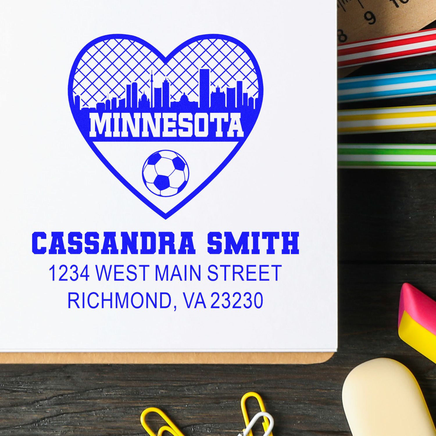 Custom Minnesota soccer heart rubber stamp with skyline, name, and address for personalized mail and craft use.