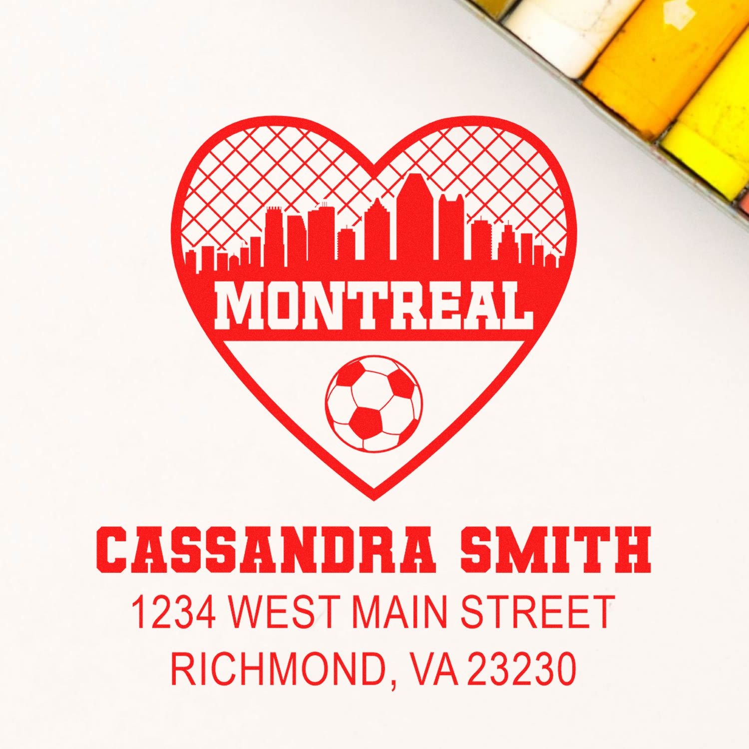 Personalized rubber stamp with Montreal skyline heart, soccer ball, and Cassandra Smith Richmond, VA address.
