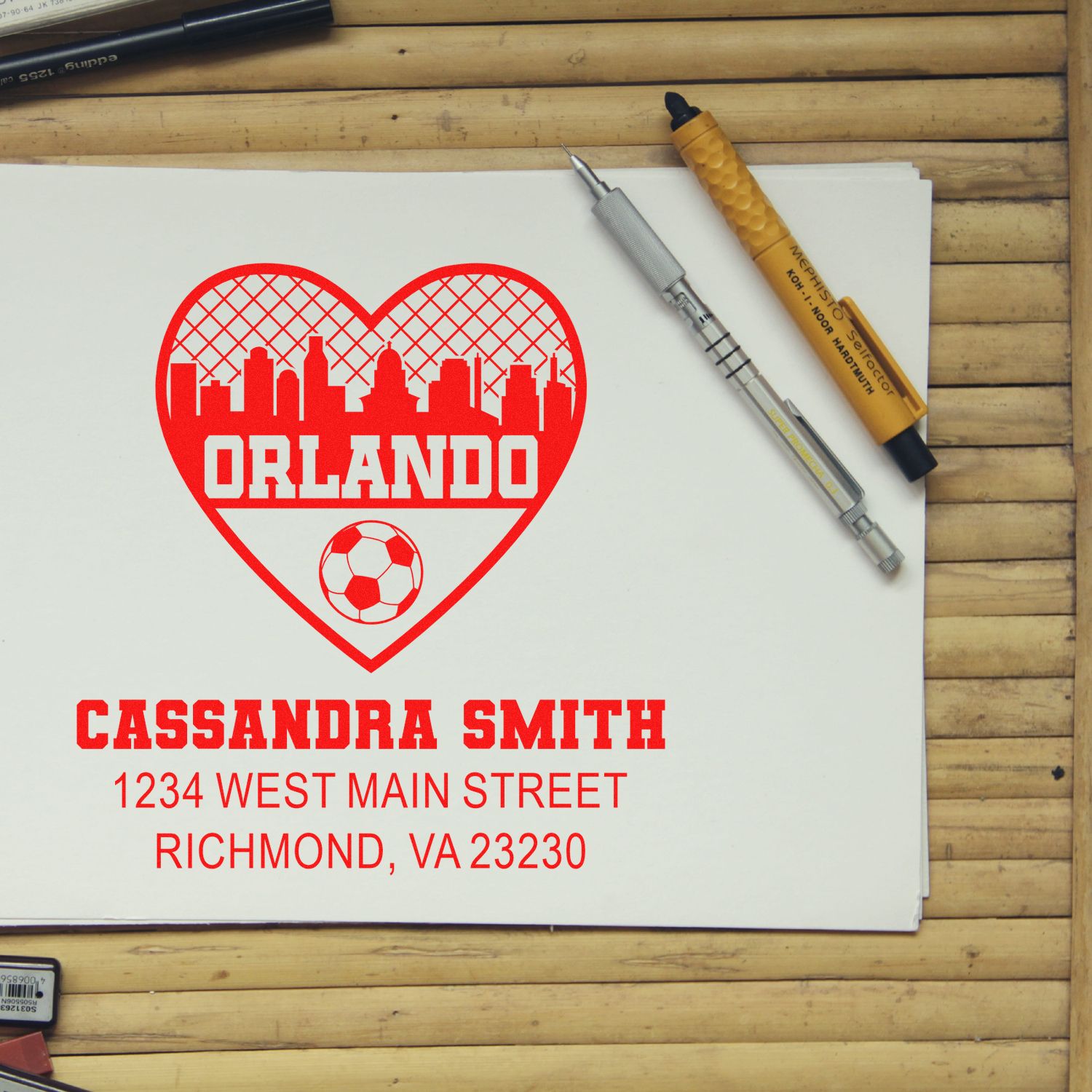 Personalized return address rubber stamp with Orlando soccer heart and Cassandra Smith address.