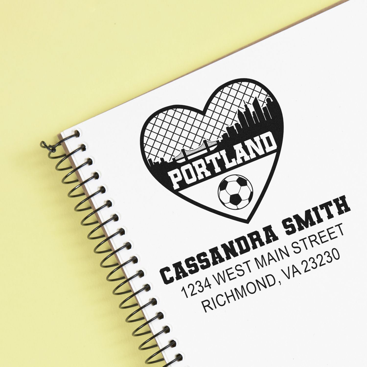 Custom rubber stamp design with Portland logo and return address, ideal for business branding and mailing.