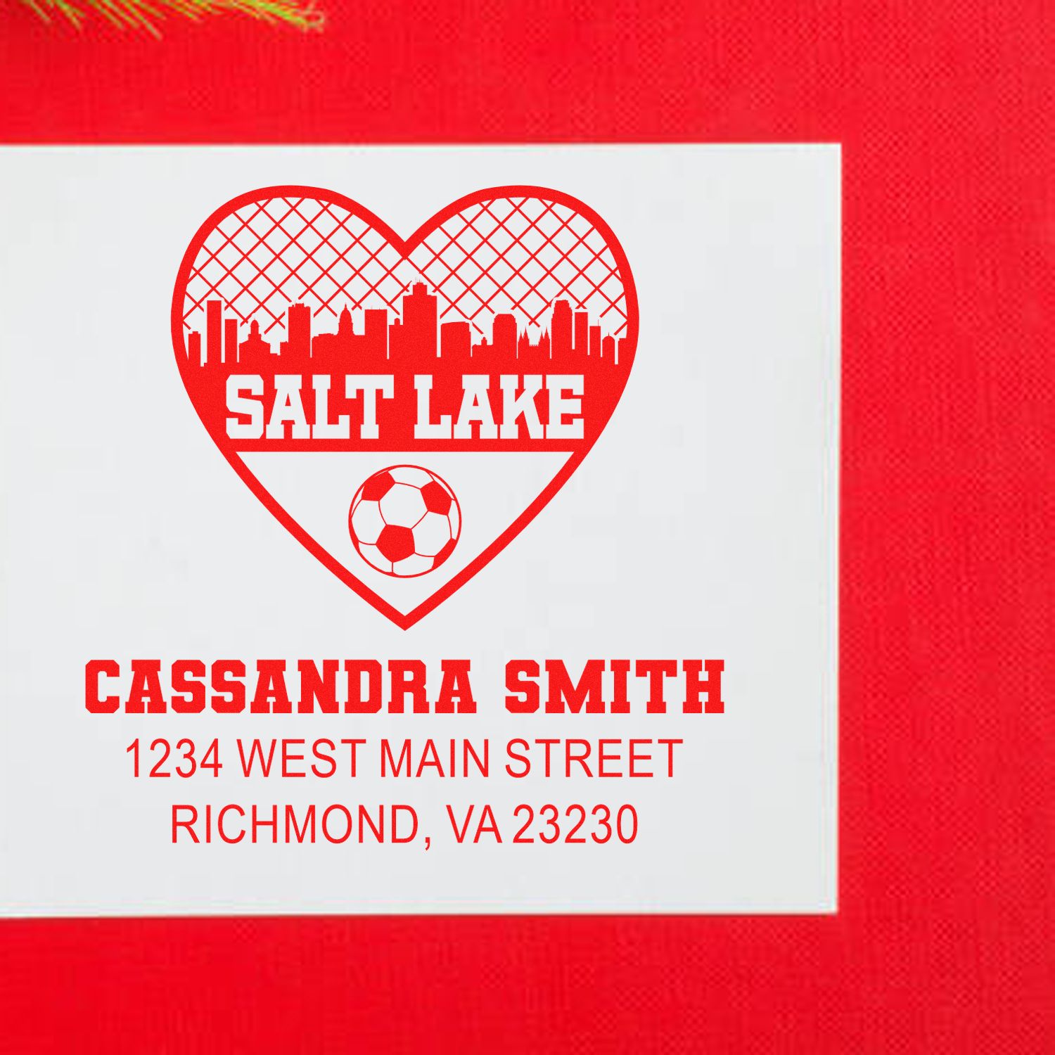 Custom personalized rubber stamp with Salt Lake skyline heart, soccer ball, Cassandra Smith name, and Richmond, VA return address.