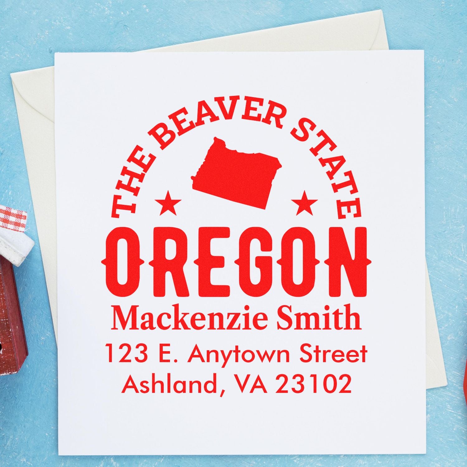 Custom Oregon return address rubber stamp with Beaver State design, Mackenzie Smith, Ashland, VA 23102.