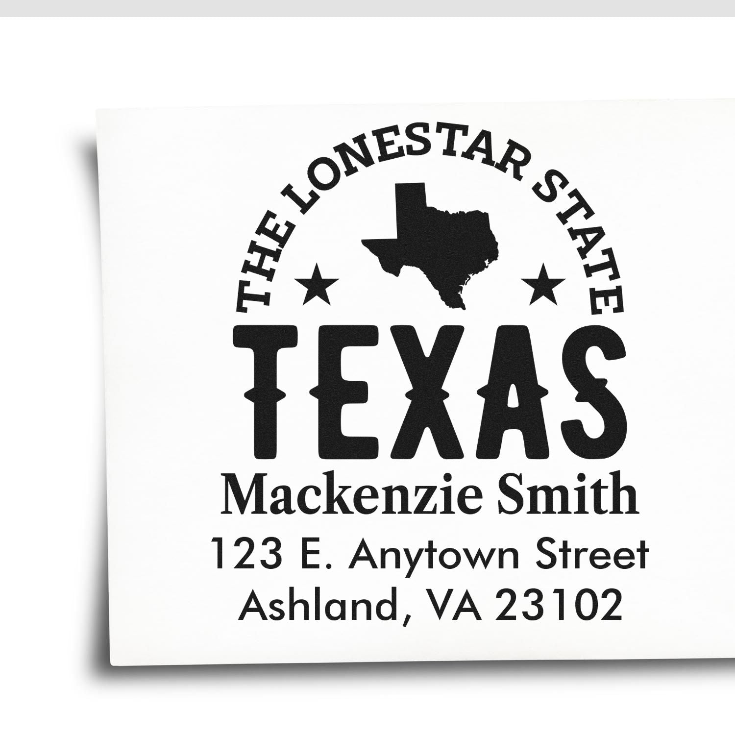 Custom Texas return address rubber stamp with Lone Star State design, name, and mailing address.