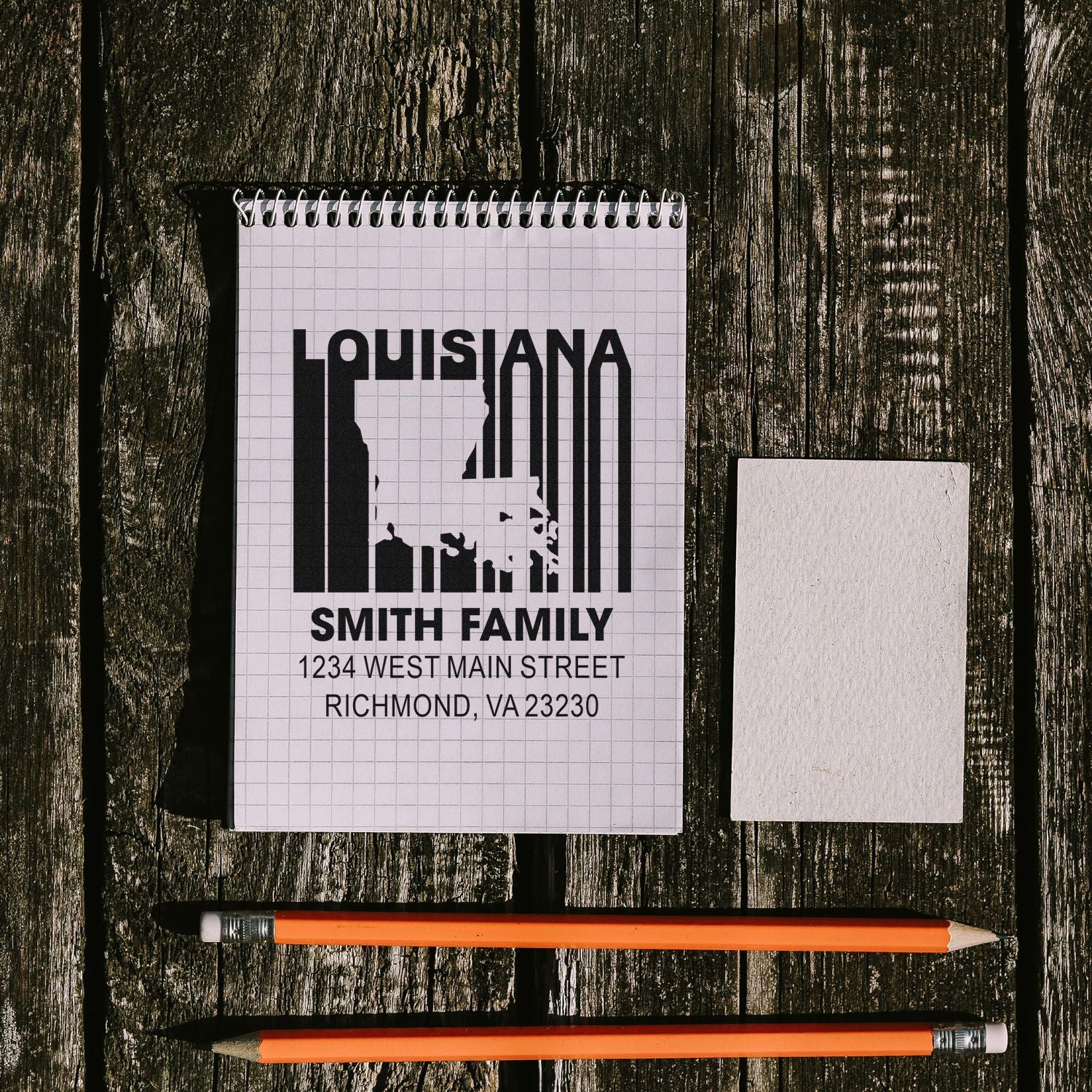 Custom rubber address stamp mockup featuring Louisiana map, Smith family name, and Richmond, VA return address.