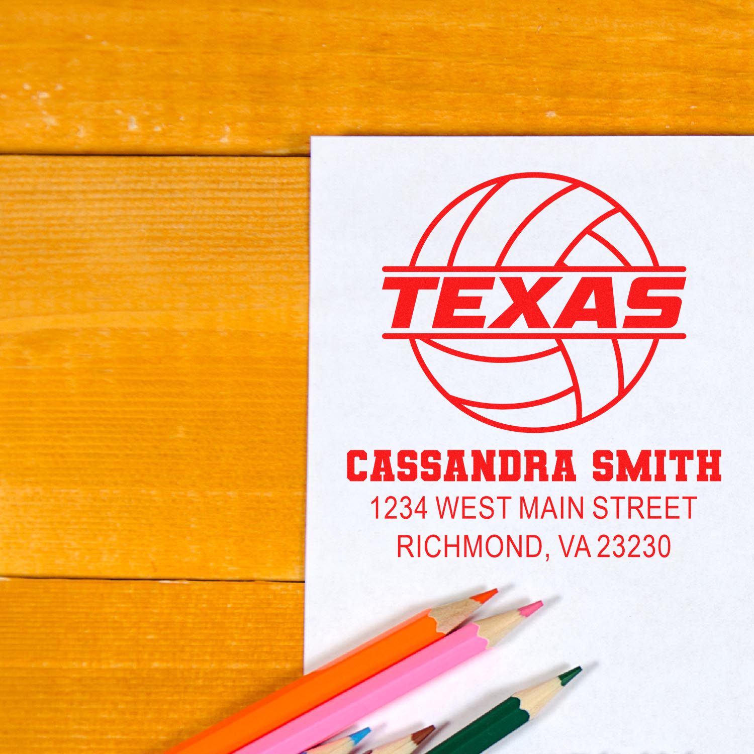 Custom Texas volleyball rubber stamp with Cassandra Smith name and address, printed on paper with pencils.
