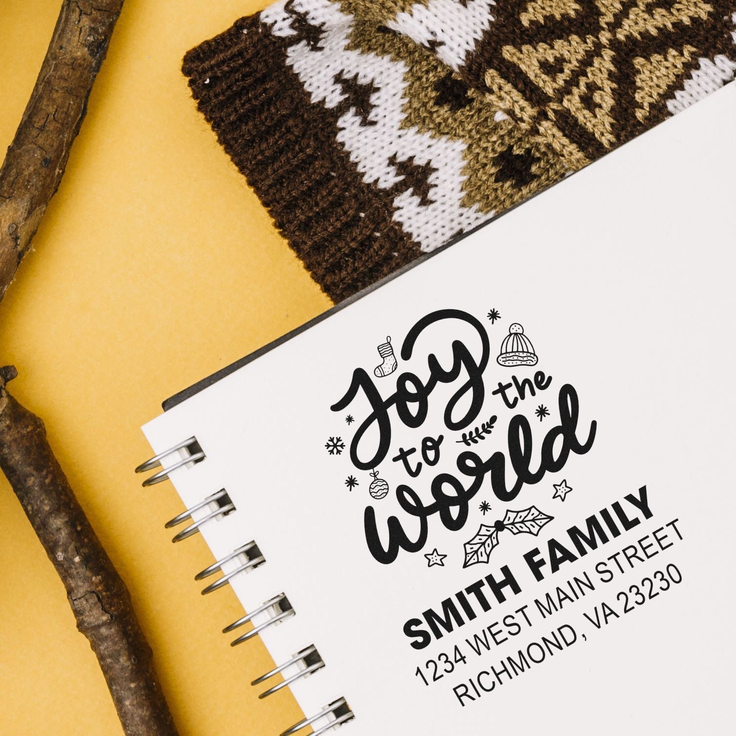 Custom holiday rubber stamp with Joy to the World design for personalized Christmas cards and family address labeling.