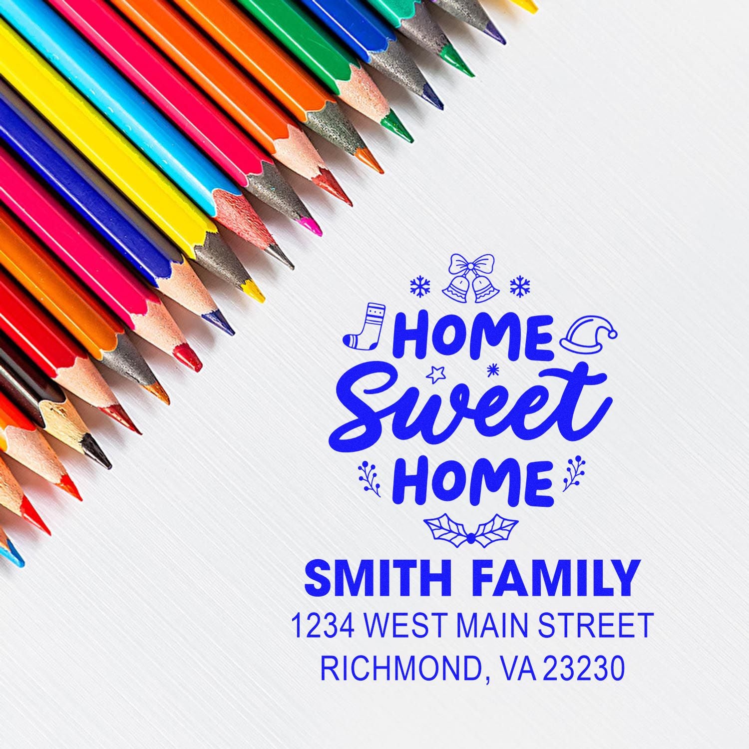 Custom return address rubber stamp design with Home Sweet Home and Smith family address, shown with colorful pencils.