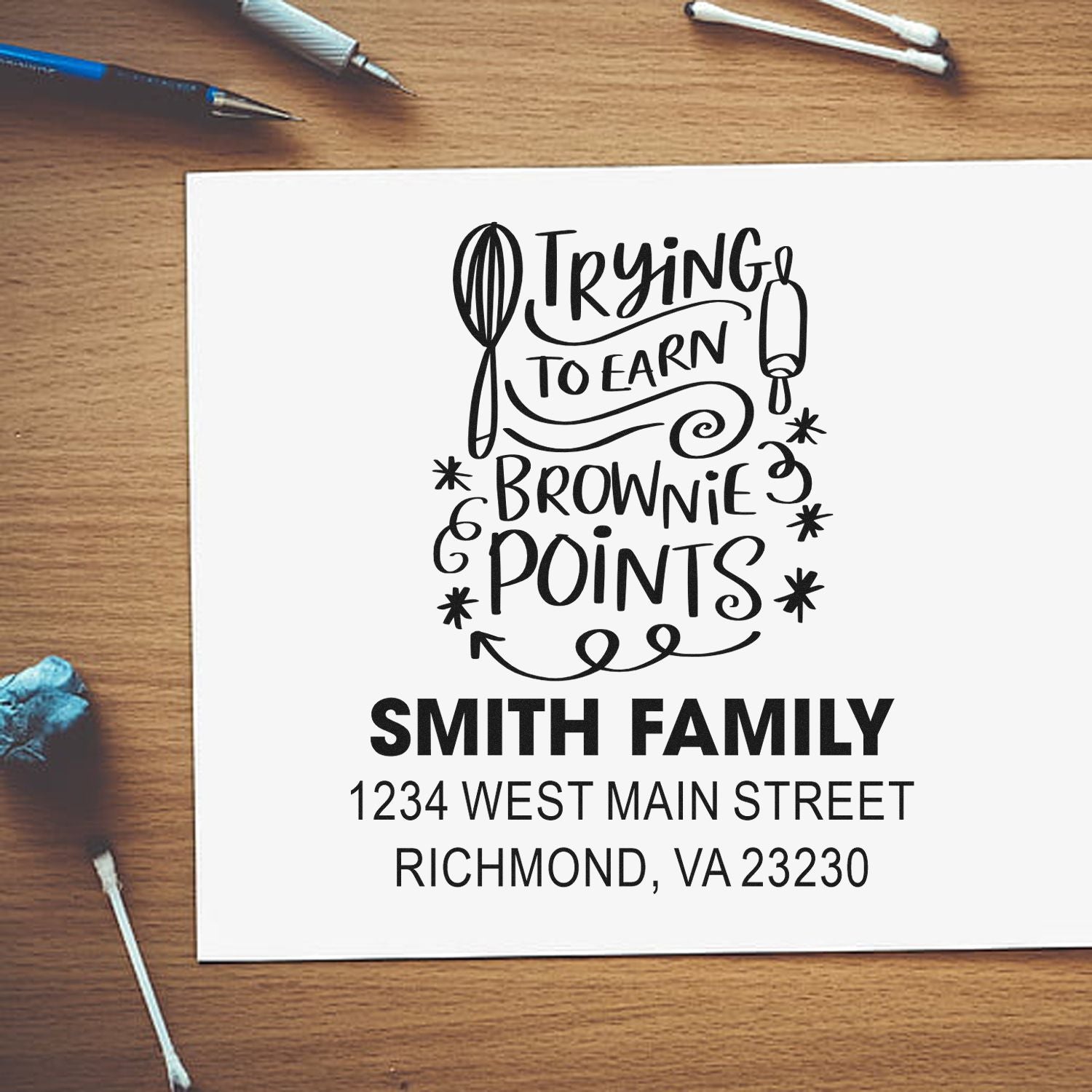 Personalized address rubber stamp mockup for Smith family with Trying to Earn Brownie Points kitchen design