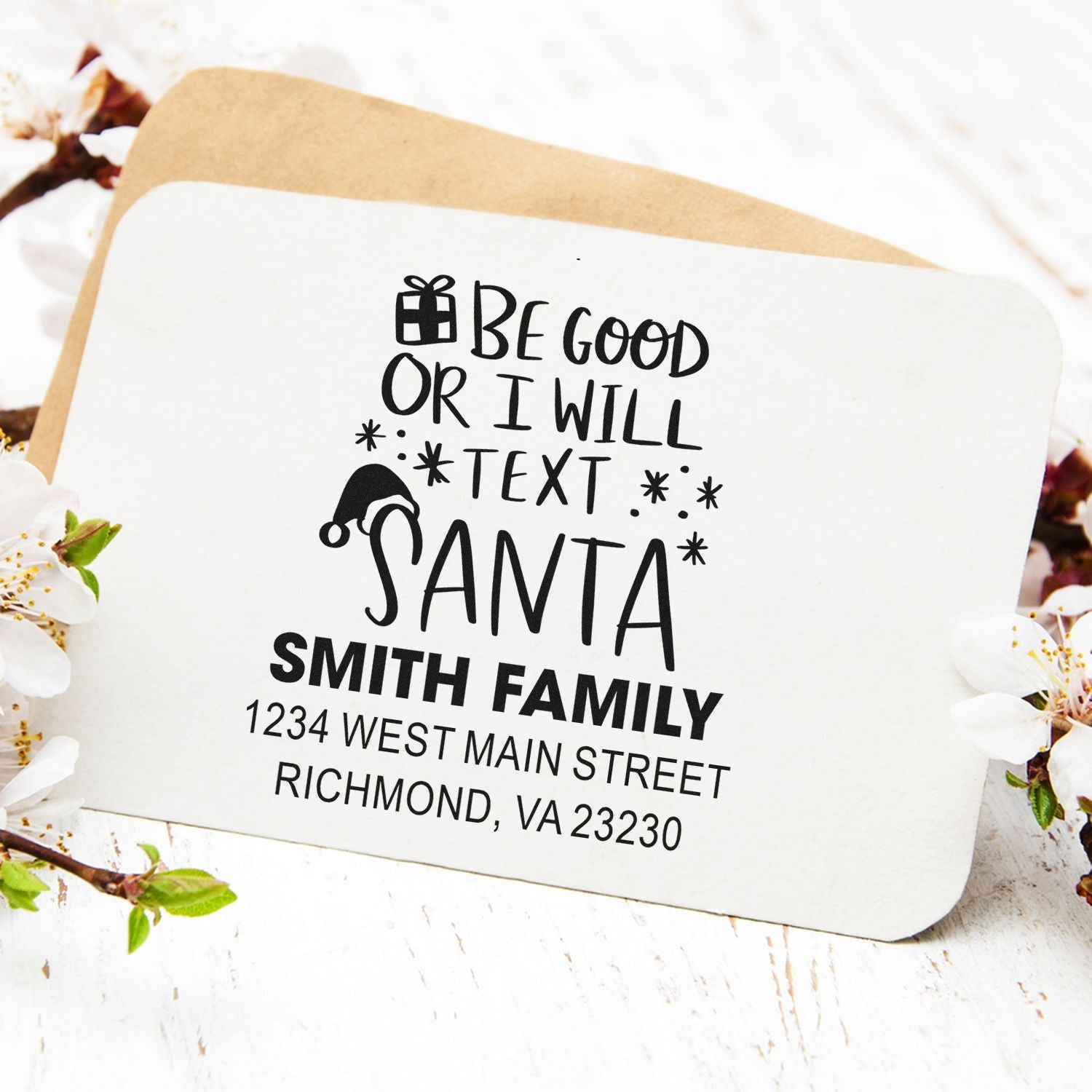 Personalized Christmas return address rubber stamp with Santa joke, Smith Family name, and Richmond, VA mailing address.