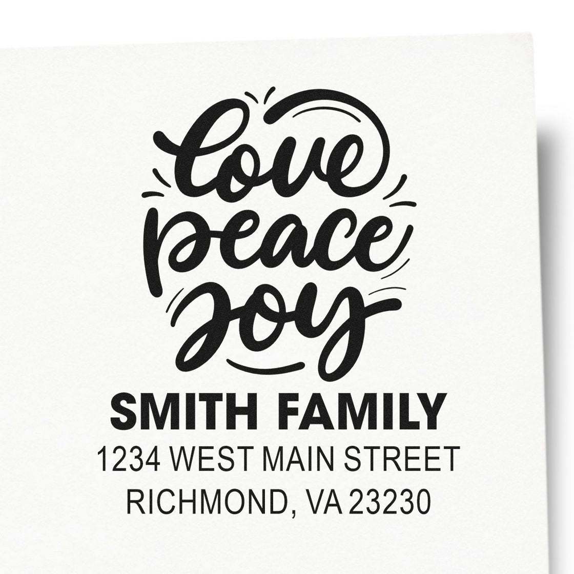 Personalized return address rubber stamp with Love Peace Joy script and Smith Family address for holiday cards.