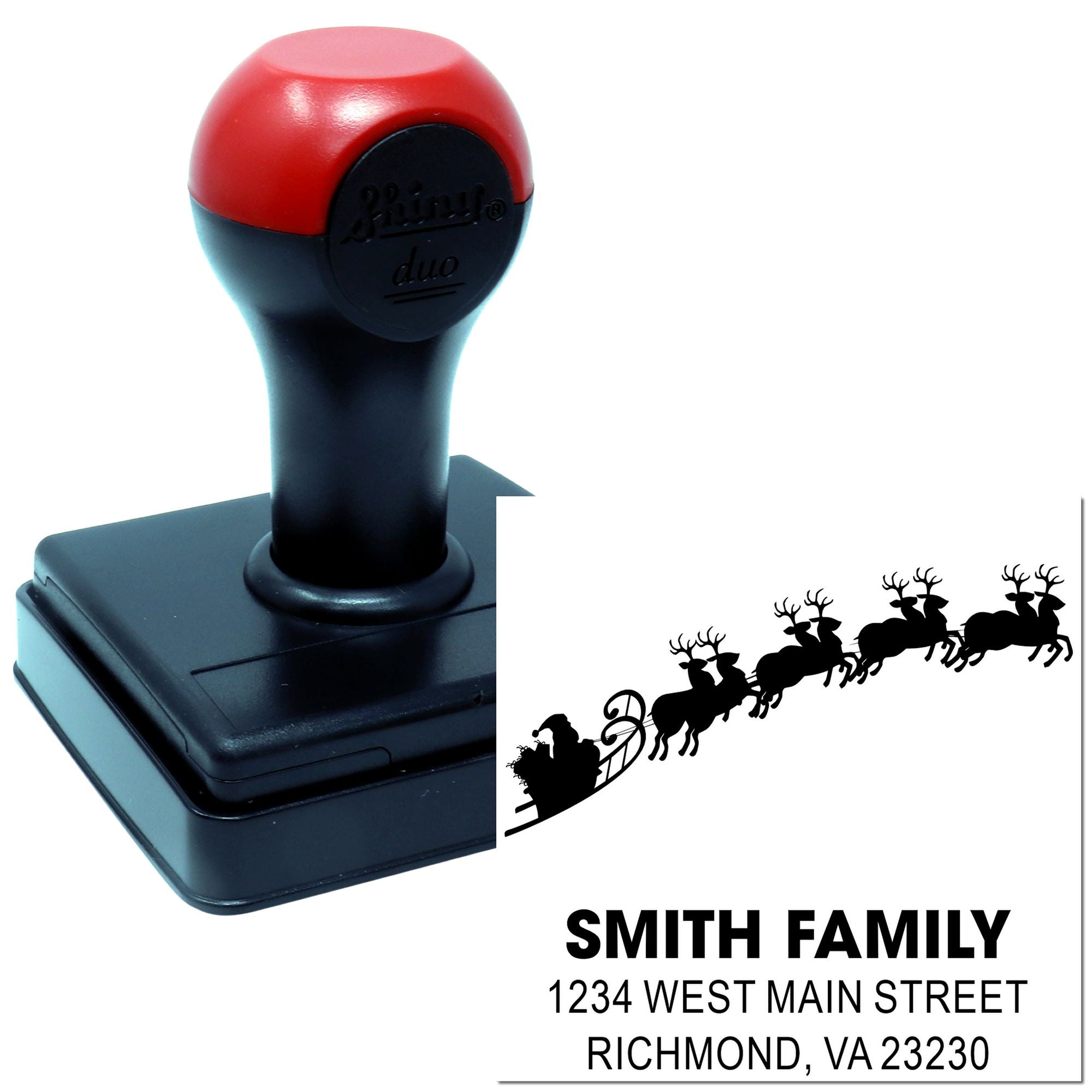 Custom self-inking return address rubber stamp with Santa sleigh design and Smith Family address imprint