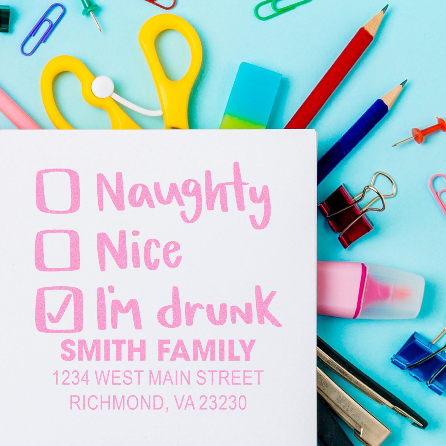 Personalized rubber stamp mockup with naughty, nice, and Im drunk checklist, plus custom family address stamp design.