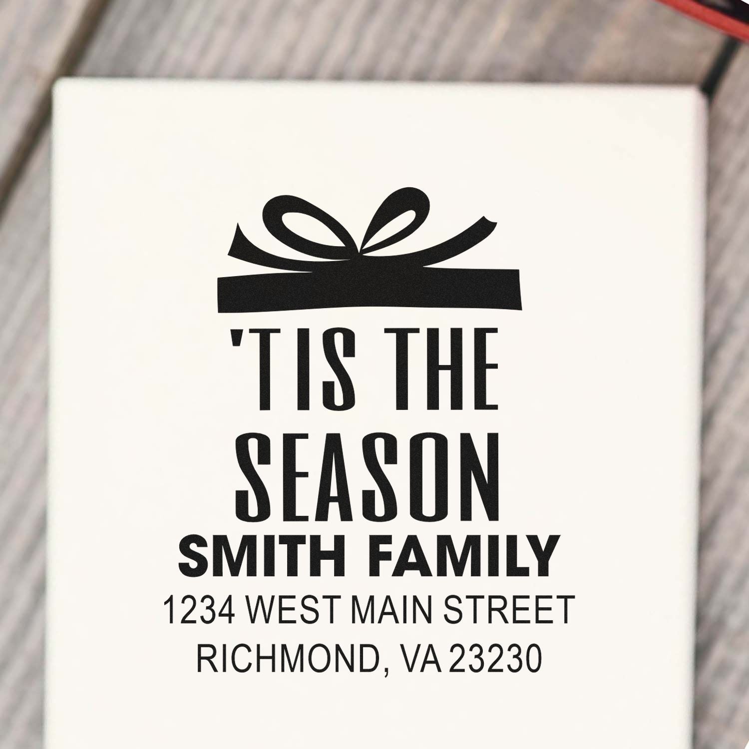 Custom holiday return address rubber stamp with gift icon: 'Tis the Season Smith Family, Richmond, VA 23230