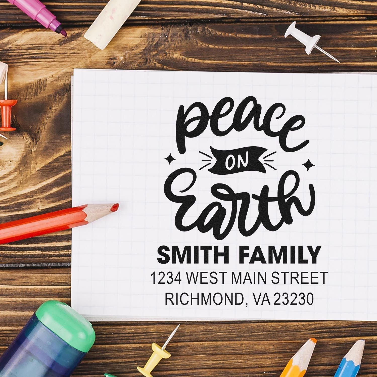 Personalized rubber stamp design with Peace on Earth and Smith family return address for holiday cards.