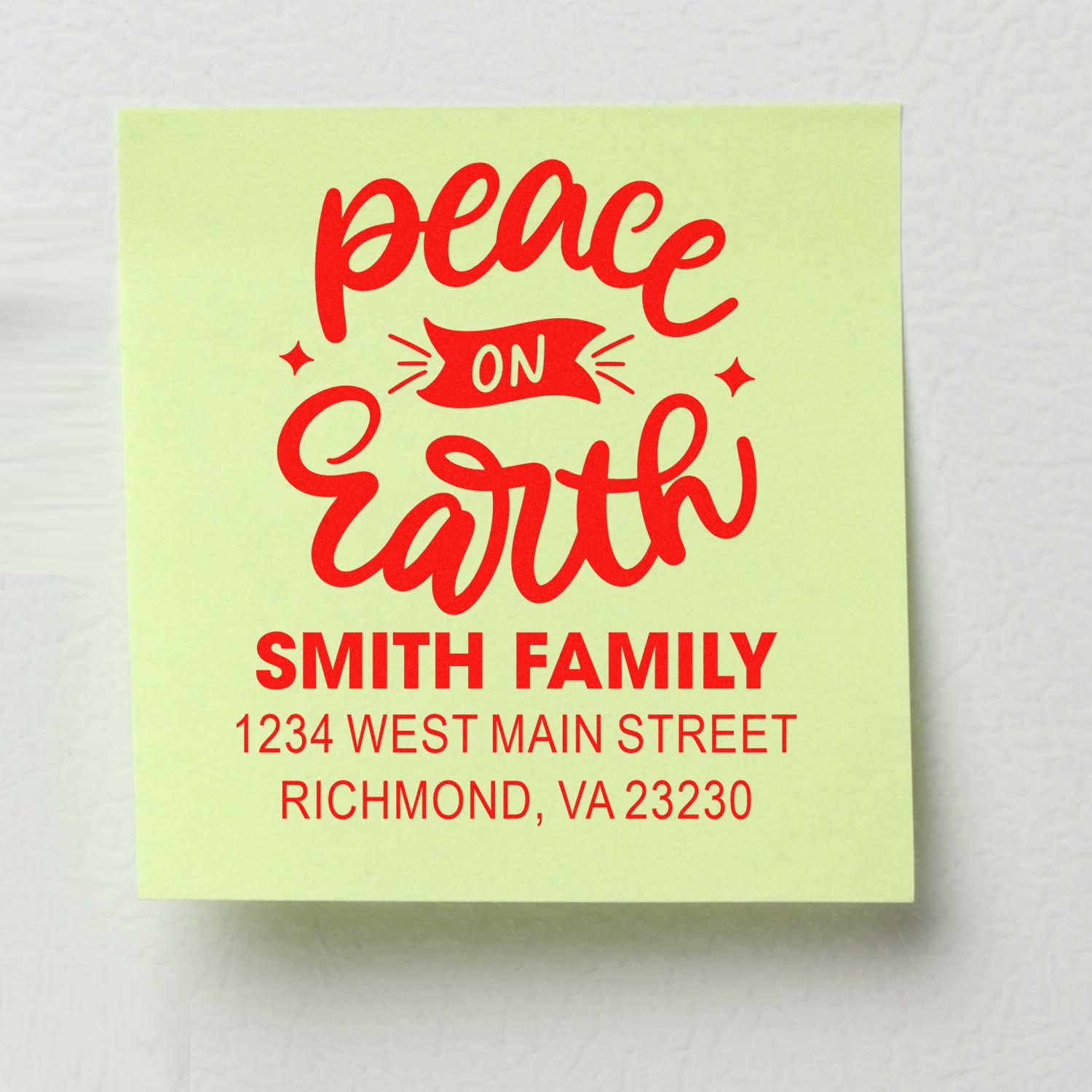 Custom rubber stamp design for holiday cards with Peace on Earth and Smith Family return address in Richmond, VA 23230.