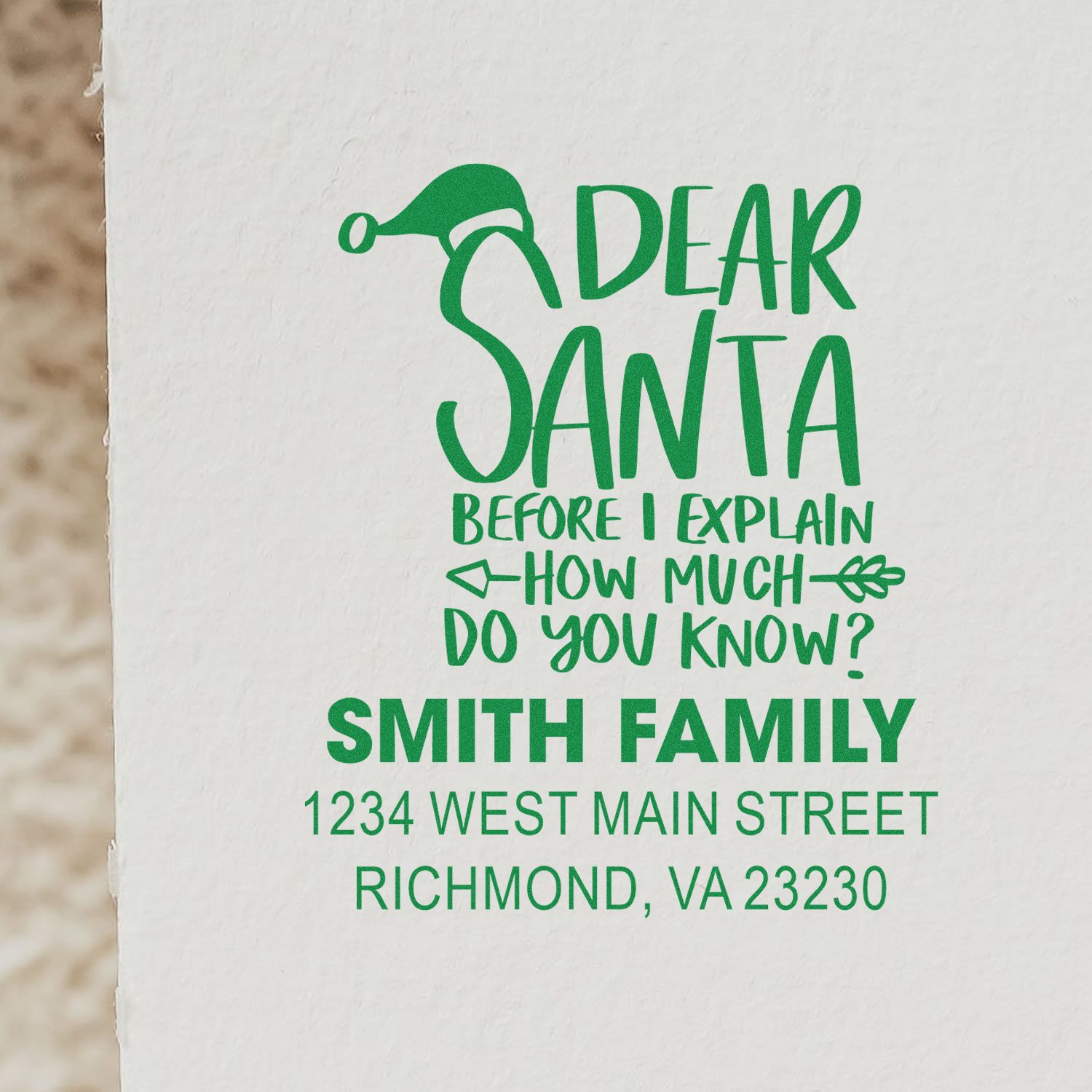 Custom Dear Santa return address rubber stamp for holiday cards, featuring family name and address.