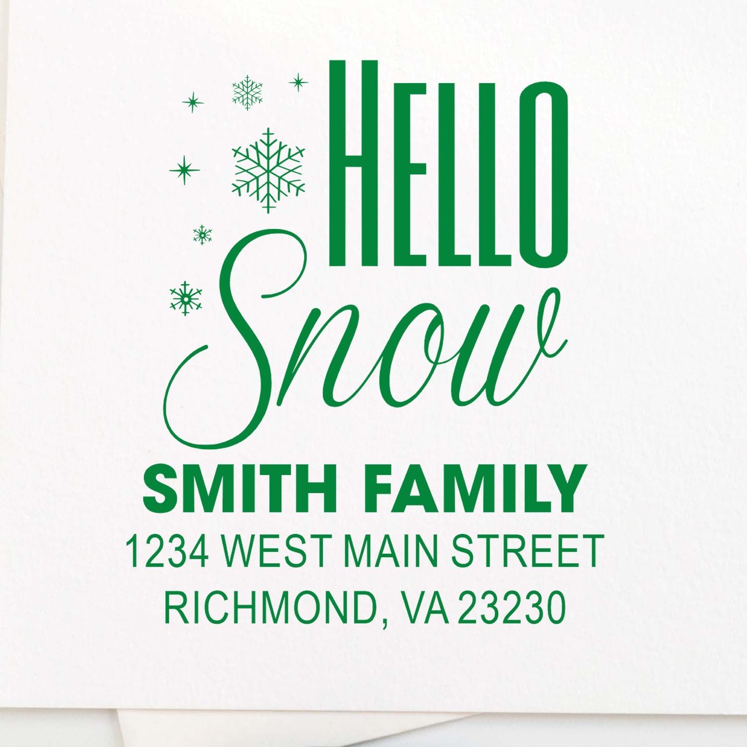 Personalized Christmas rubber stamp with Hello Snow design, Smith Family name, and return address for holiday mail.
