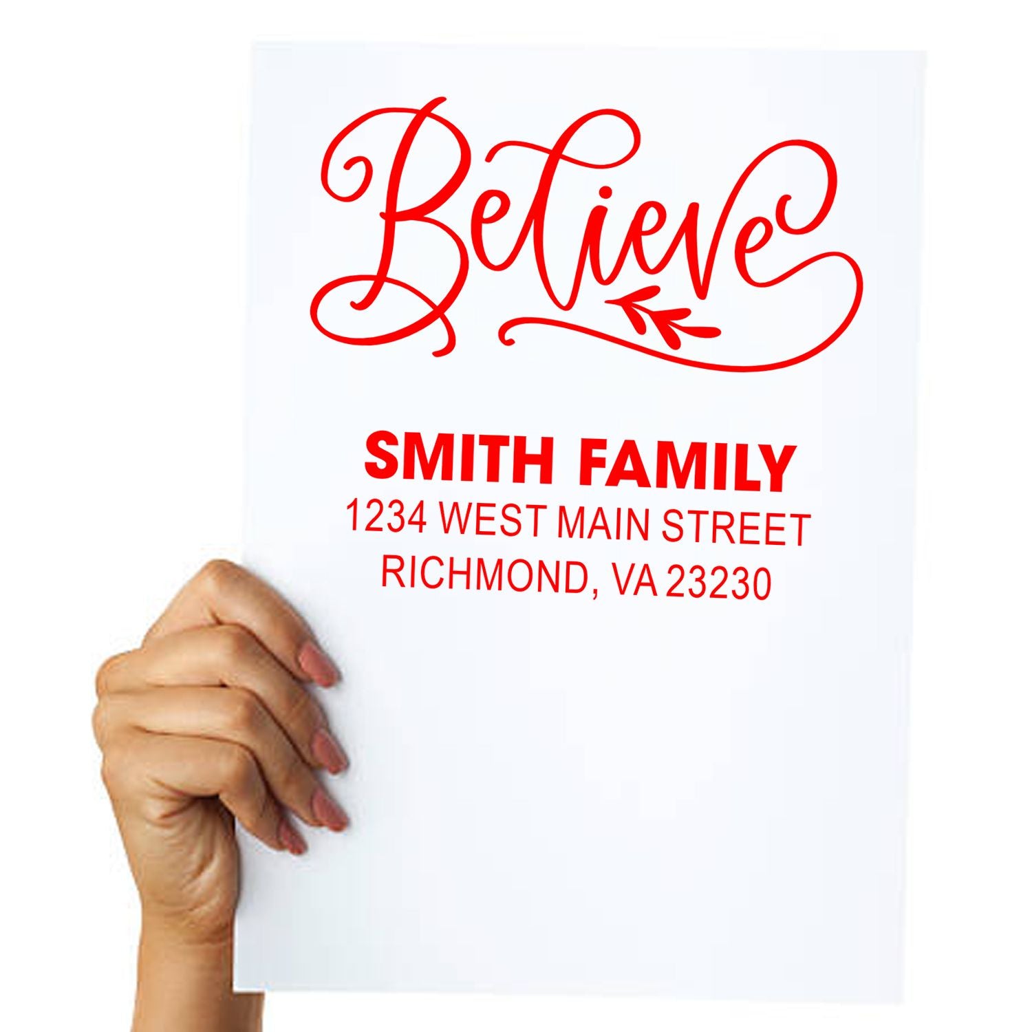 Custom rubber stamp with Believe script and Smith Family return address for personalized mailing and crafting.