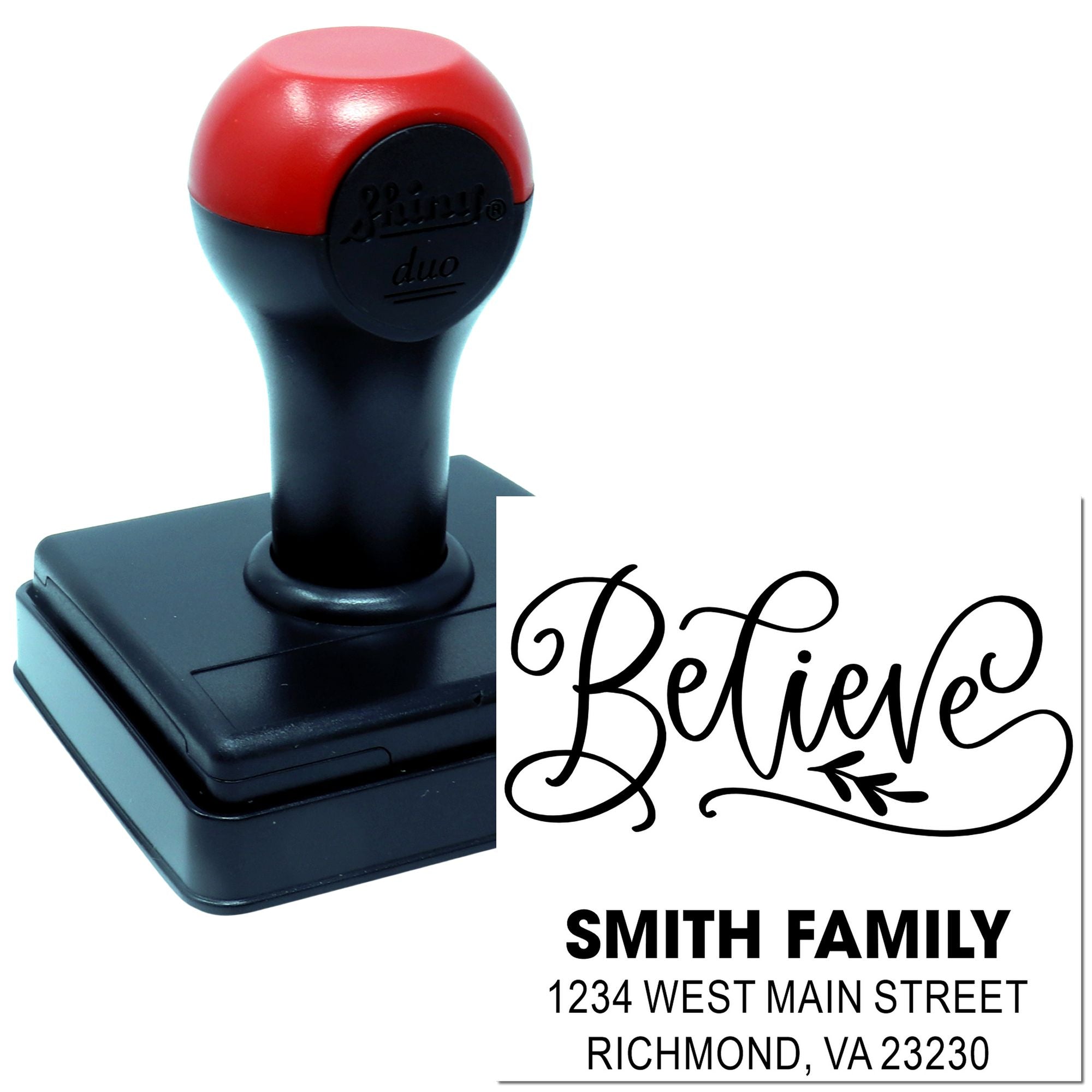 Personalized self-inking rubber stamp with decorative Believe design and Smith Family return address.