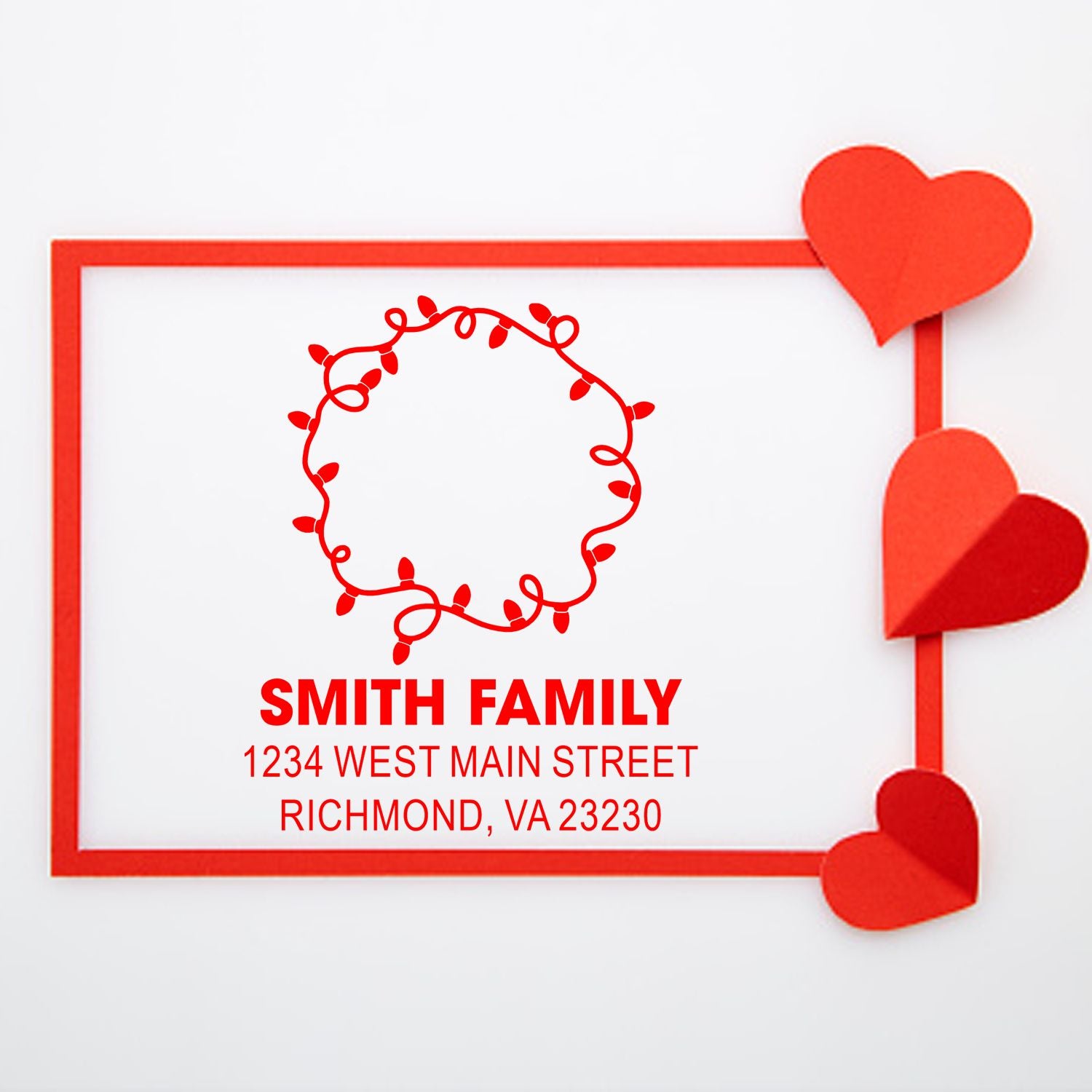 Custom rubber address stamp with heart border, Smith Family name, and Richmond VA address for wedding or holiday mail.