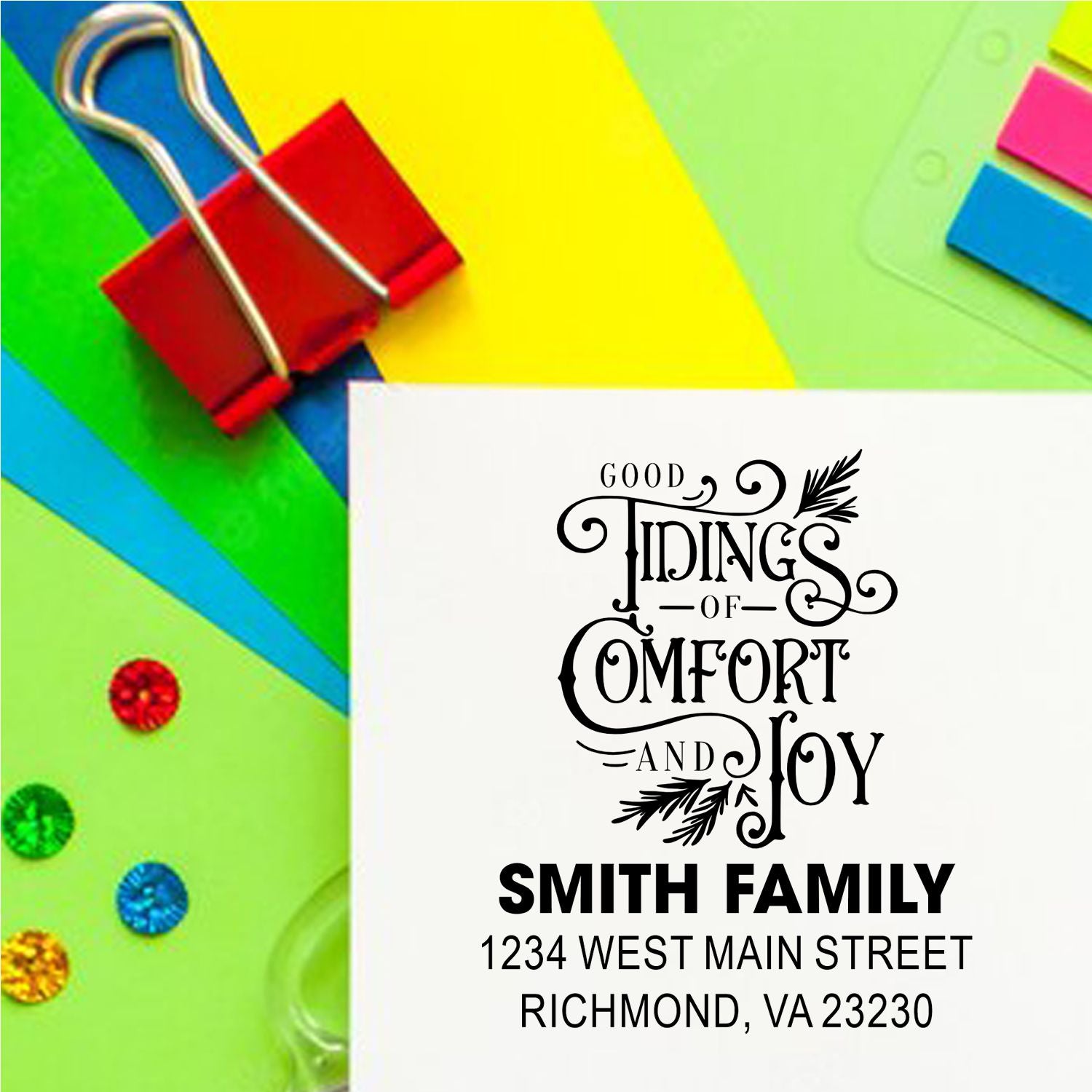 Personalized Christmas rubber stamp with Good Tidings of Comfort and Joy, Smith family name, and return address.