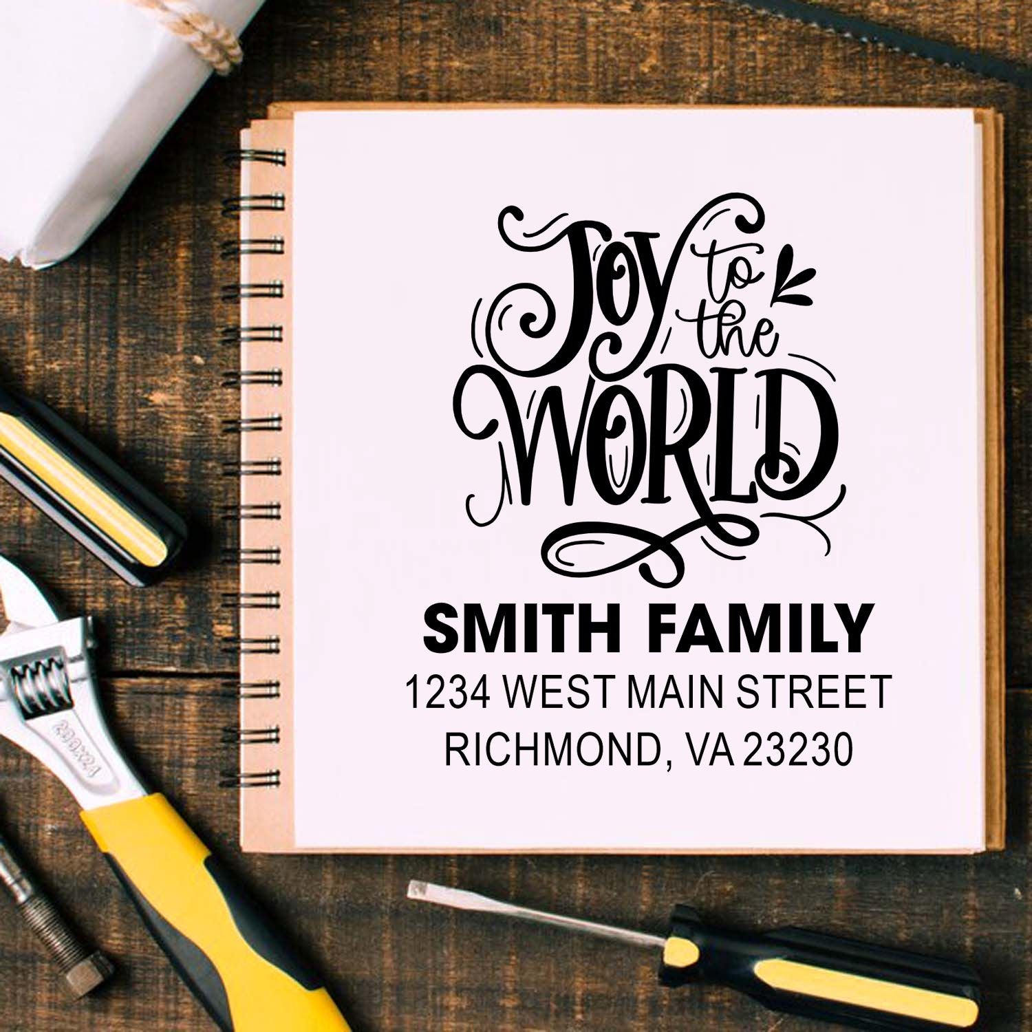 Custom holiday return address rubber stamp with Joy to the World design for Smith Family Christmas cards and envelopes.