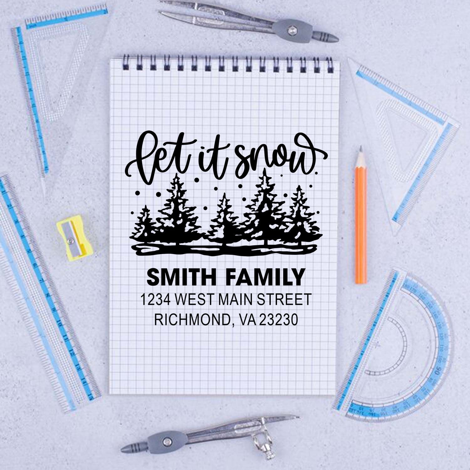 Personalized rubber stamp with Let It Snow, pine trees, and Smith Family address for holiday mail.