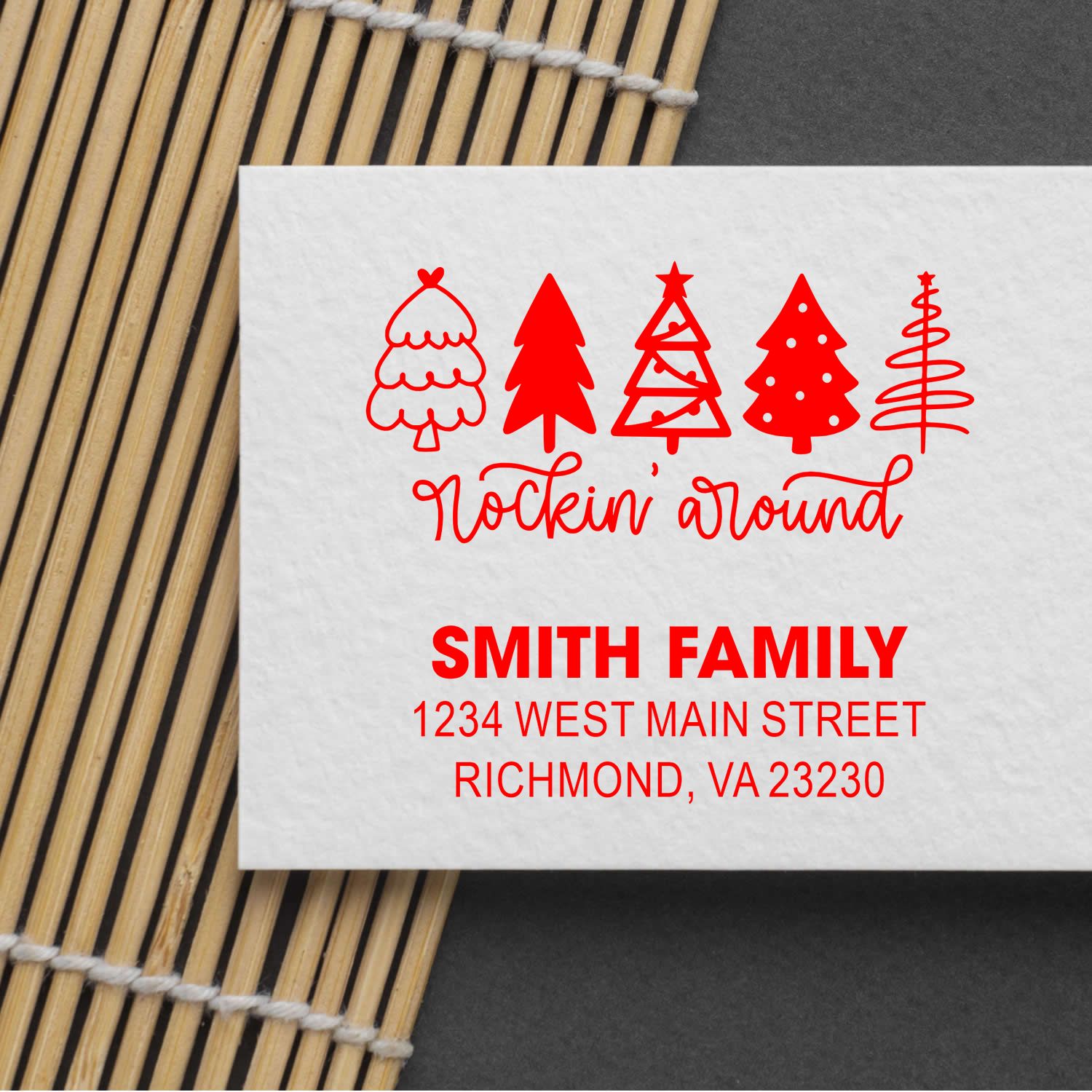 Personalized Christmas return address rubber stamp with festive tree design for holiday cards and envelopes.