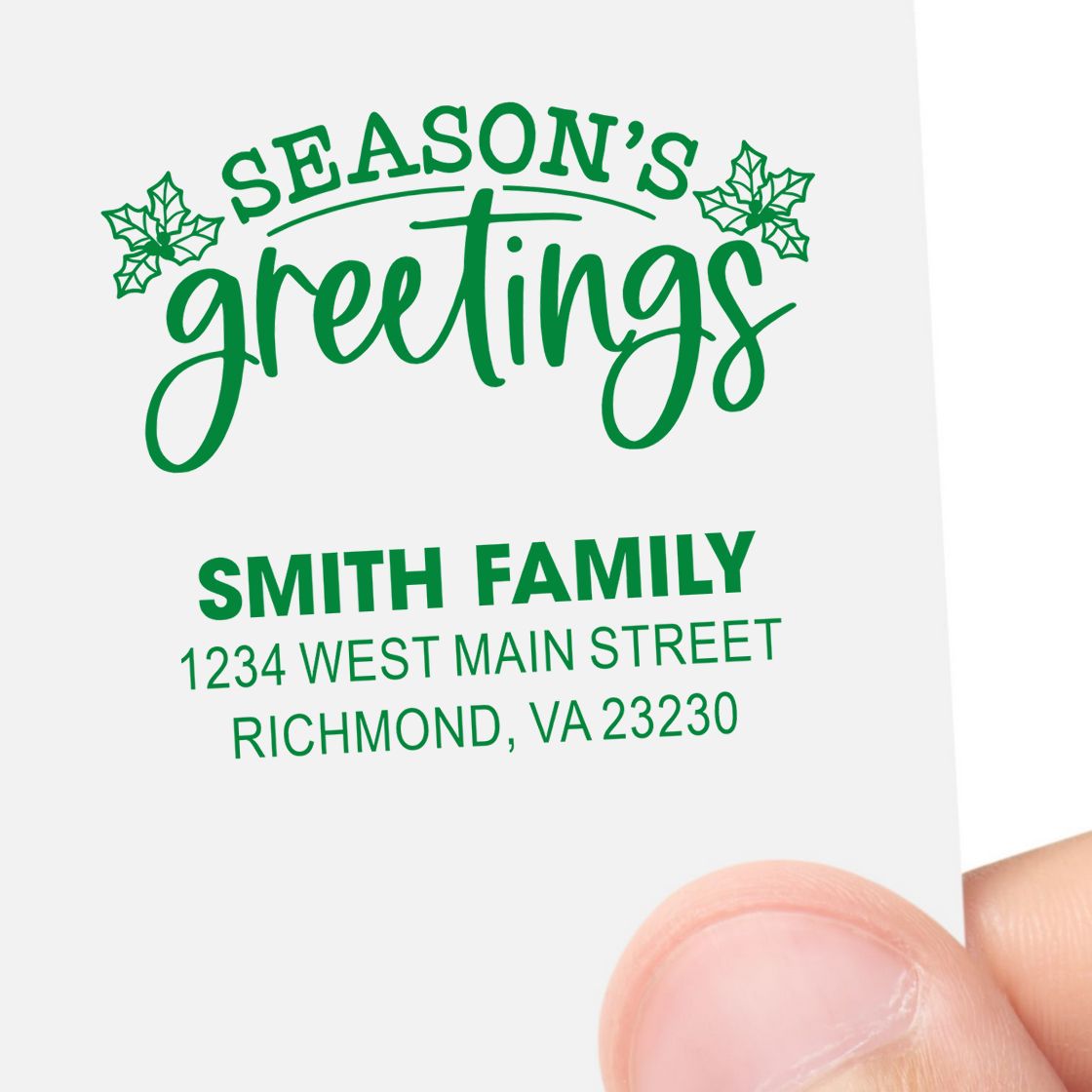 Custom Christmas rubber stamp with Seasons Greetings, Smith Family, and return address for holiday cards.