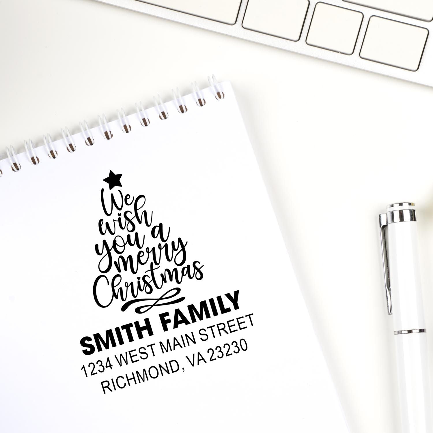 Personalized Christmas return address stamp with We wish you a Merry Christmas for the Smith family.