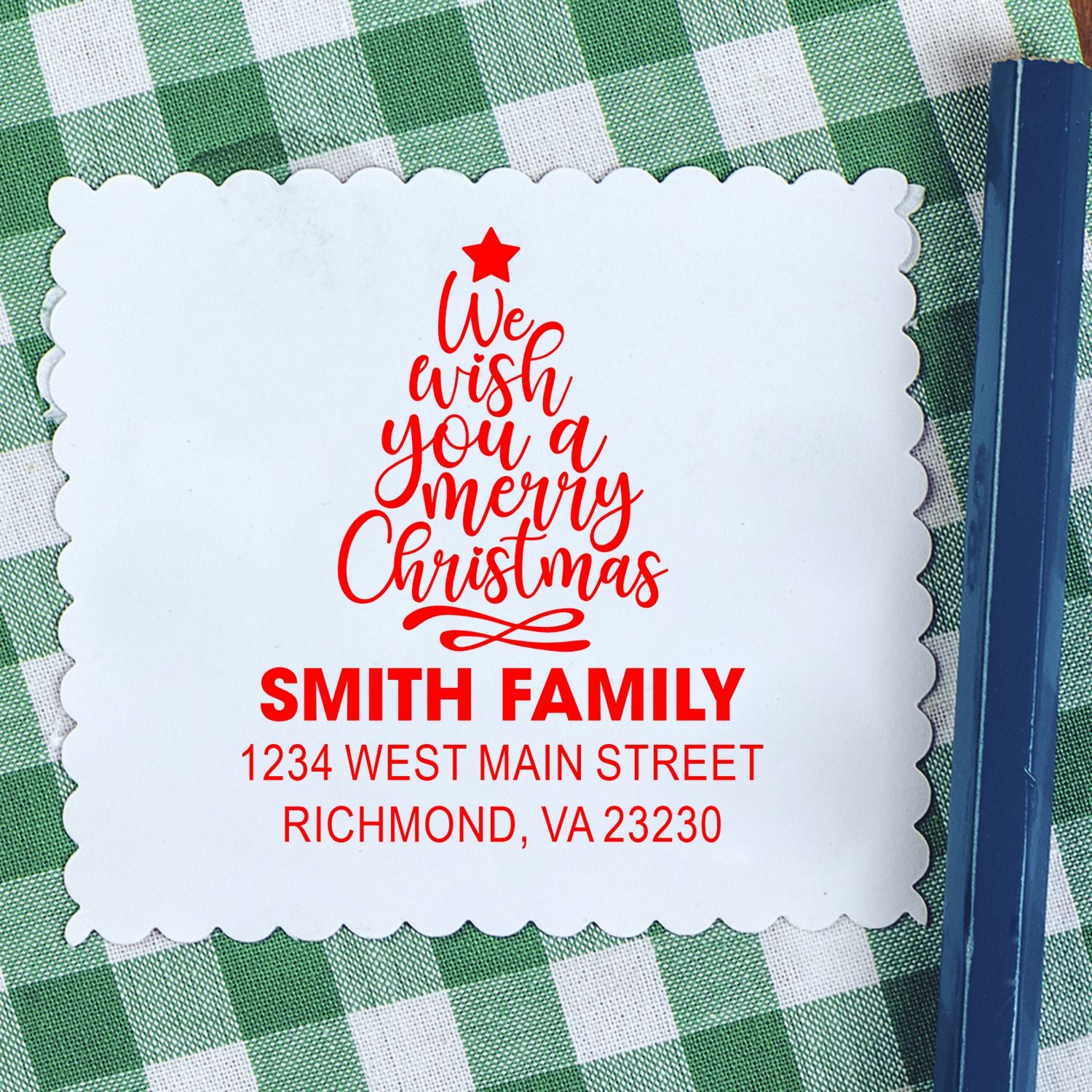 Custom Christmas address rubber stamp with We Wish You a Merry Christmas, Smith Family name, and return address.