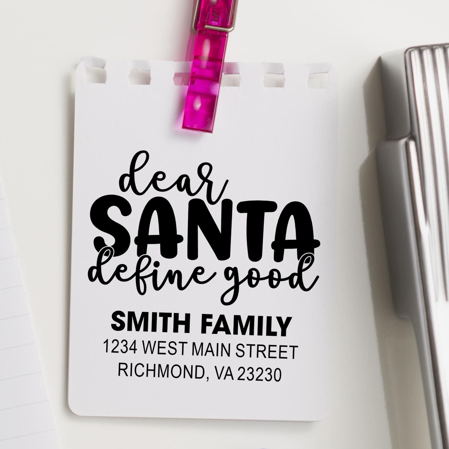 Custom rubber stamp with Dear Santa define good and Smith Family address, ideal for holiday gift tags and Christmas mail.