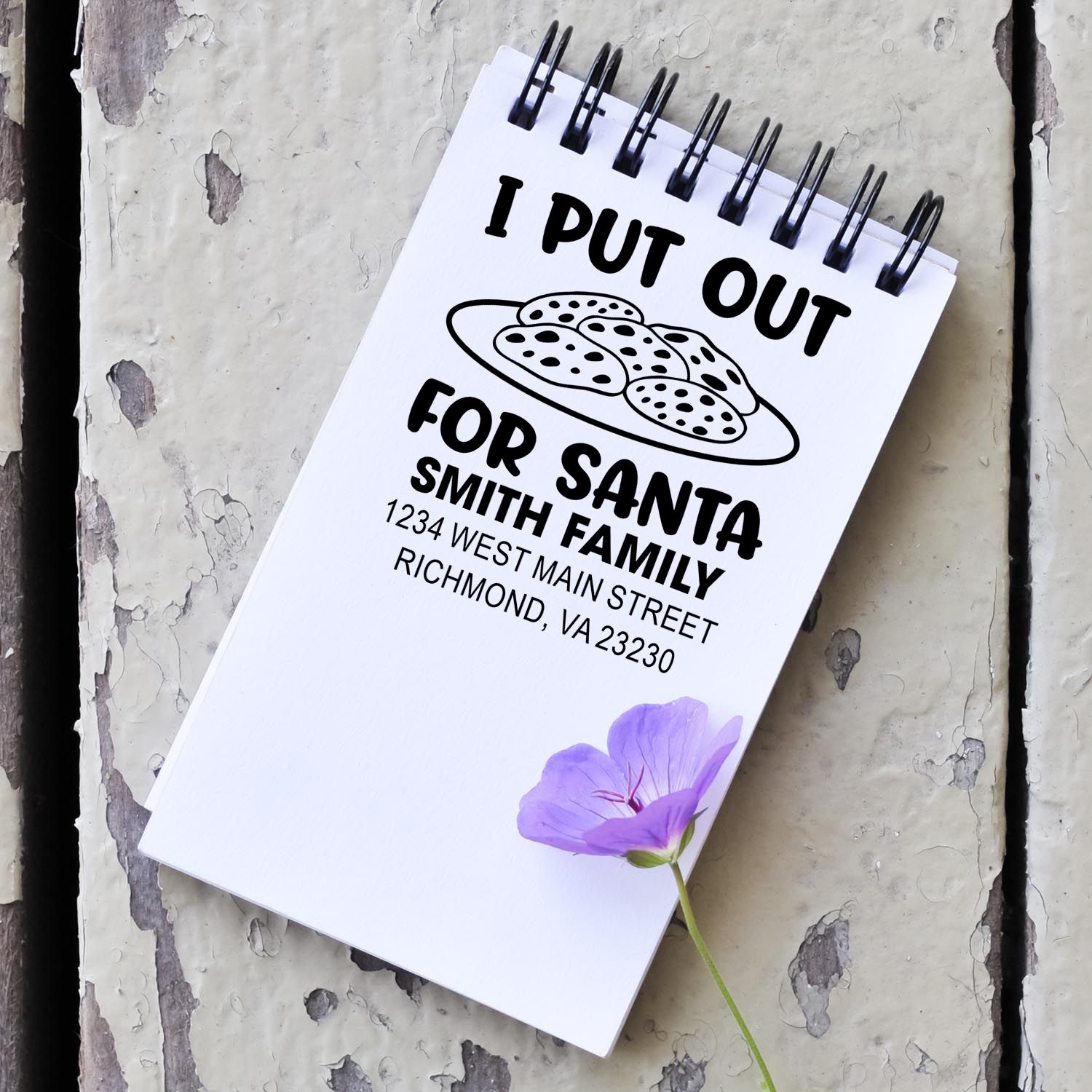 Custom Christmas rubber stamp design with cookies, family name, and return address for holiday cards.