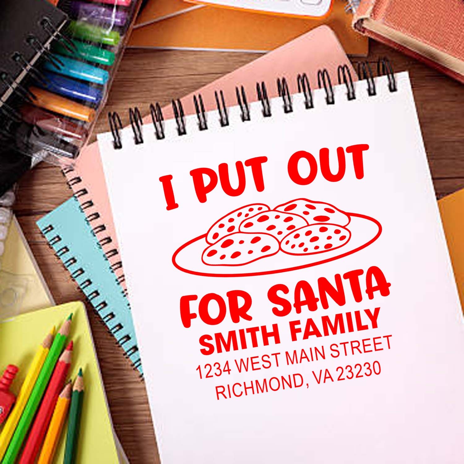 Personalized Christmas rubber stamp with I Put Out for Santa cookie graphic and Smith family return address.