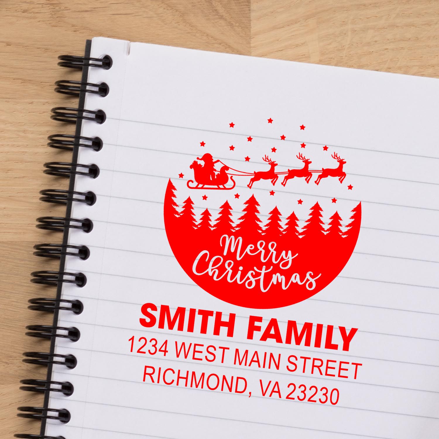 Personalized Christmas return address rubber stamp with Santa sleigh, reindeer, family name, and holiday card design.