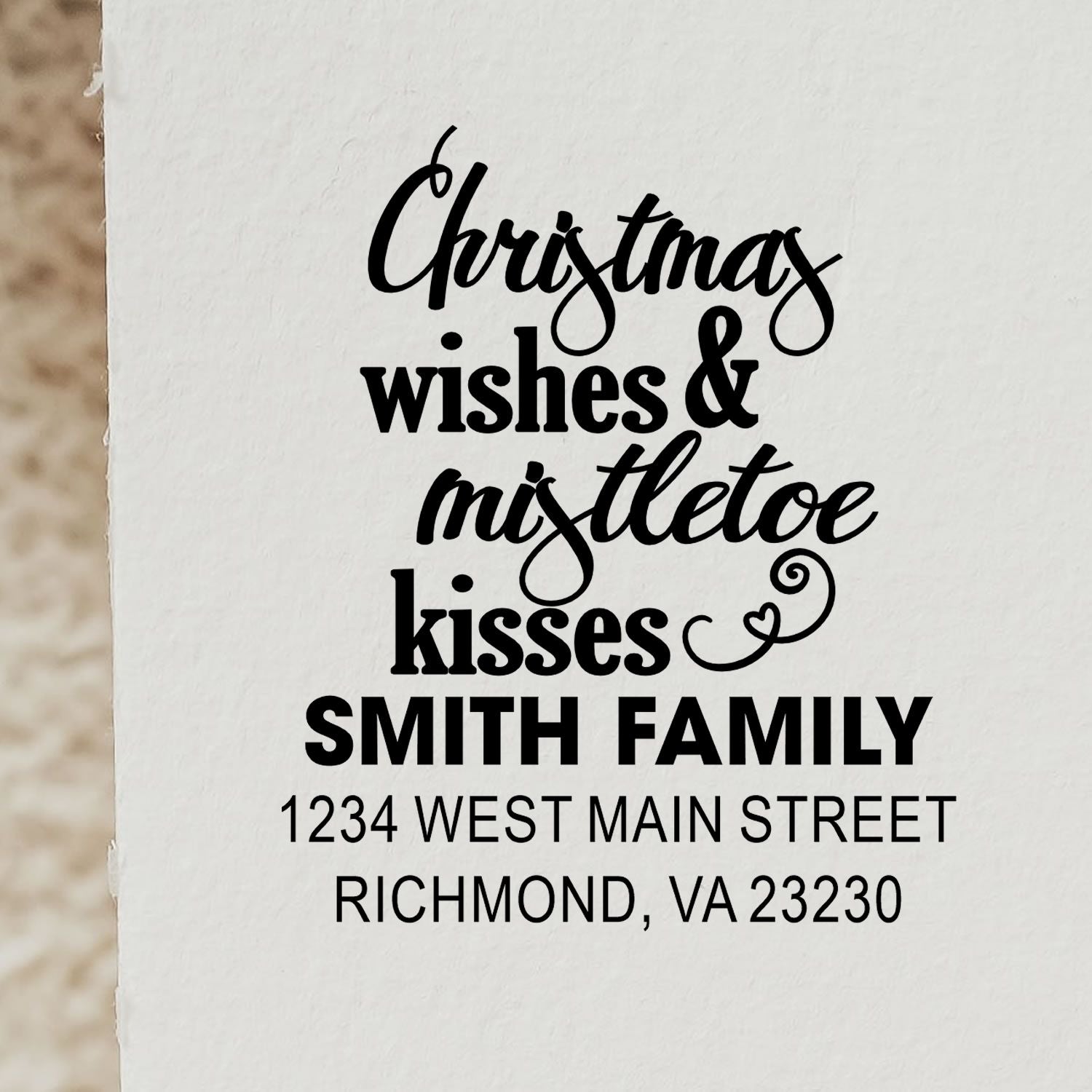 Custom holiday return address rubber stamp for Smith family, with Christmas wishes & mistletoe kisses and Richmond, VA address.