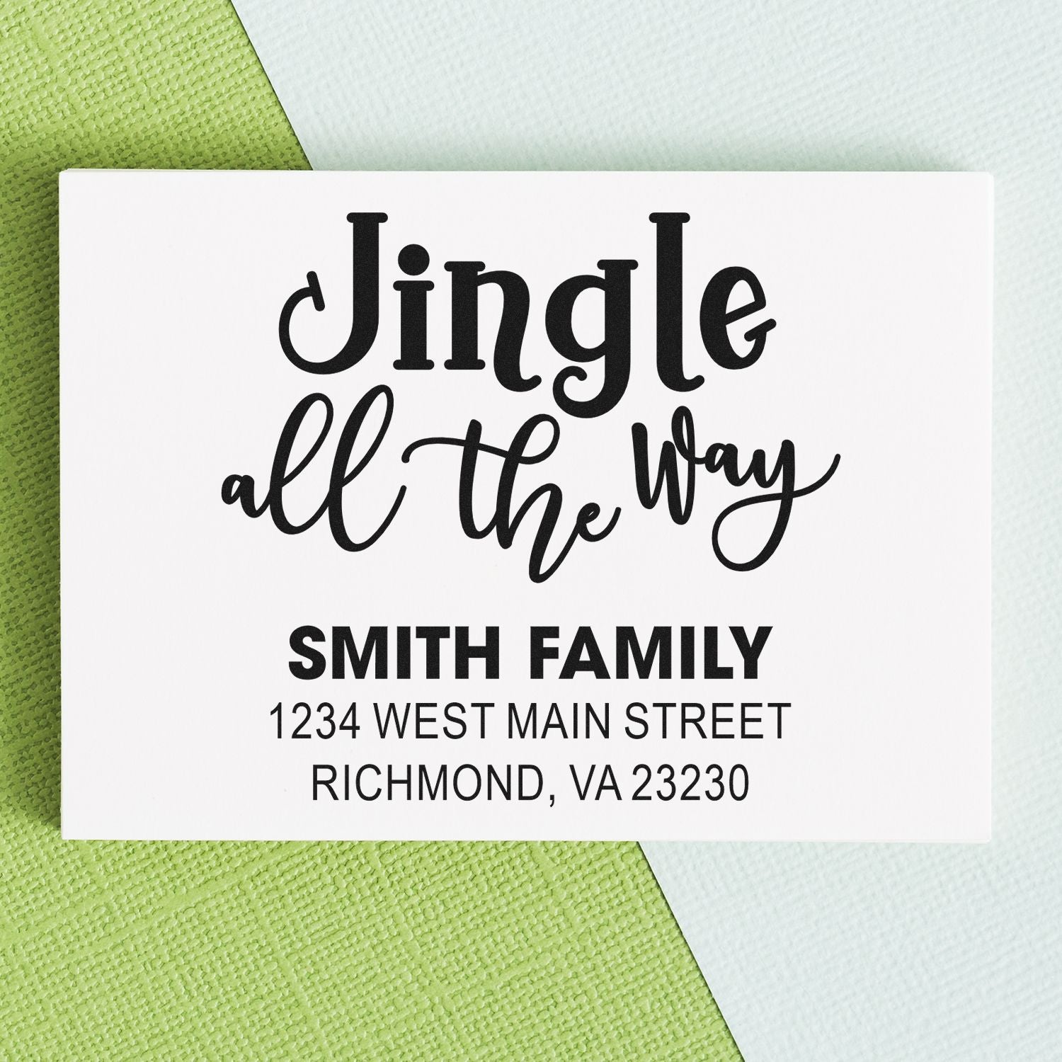 Custom holiday rubber stamp with Jingle all the way design and Smith Family return address for Christmas cards.