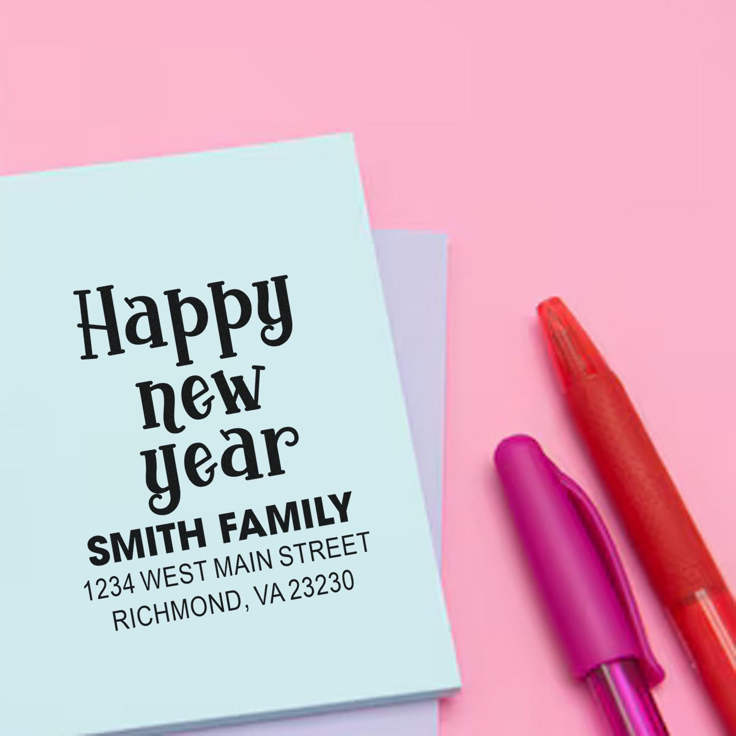 Custom Happy New Year return address rubber stamp with Smith family name and Richmond, VA address for holiday cards.