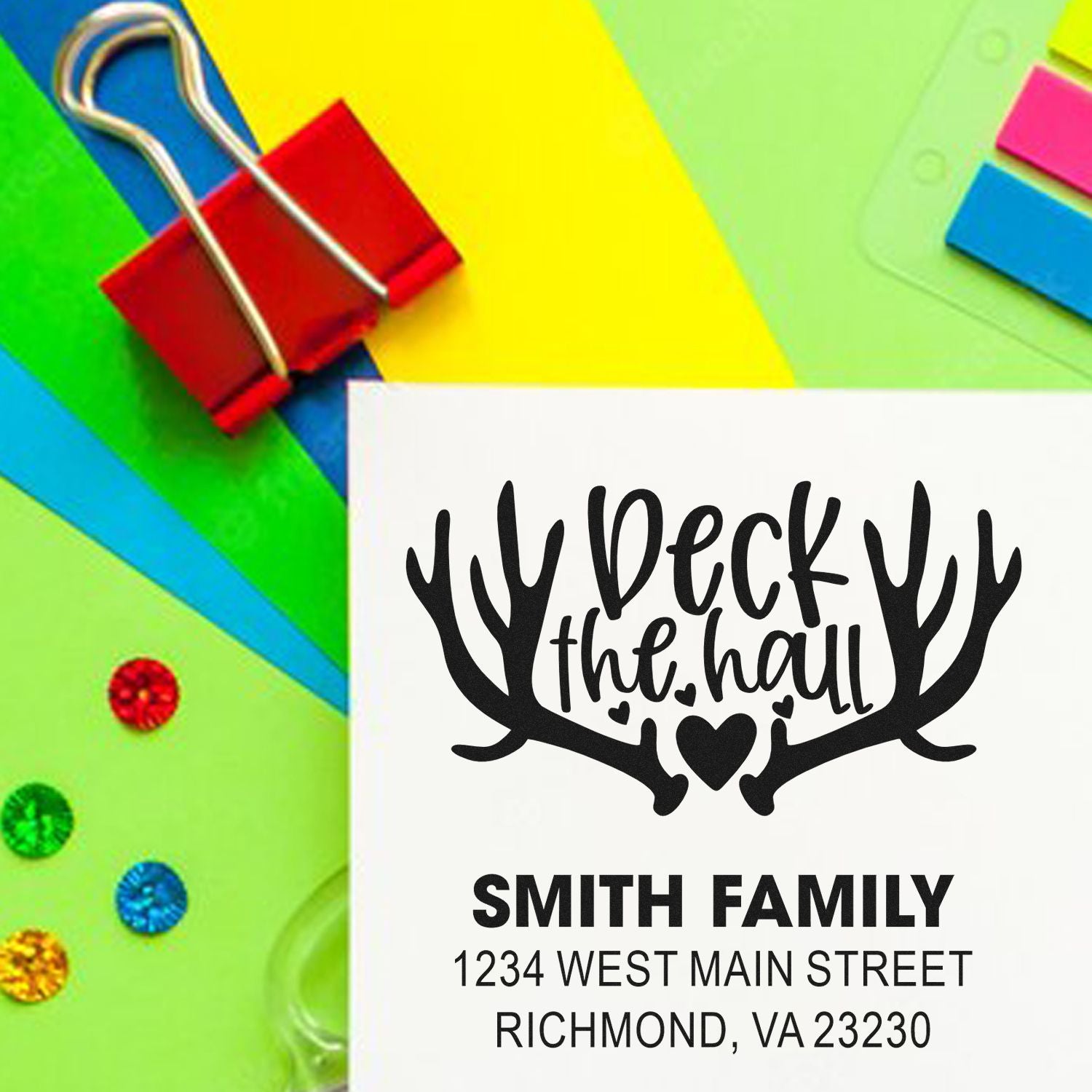 Personalized holiday rubber stamp with Deck the Hall antlers design, Smith Family name, and return address for Christmas cards.