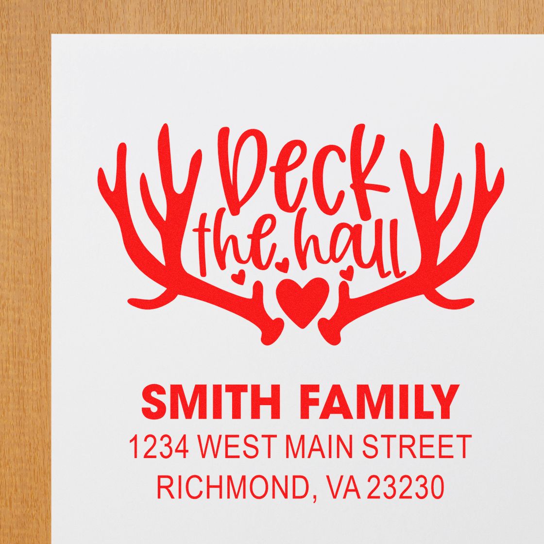 Custom Christmas return address rubber stamp with Deck the Hall antlers design for the Smith family in Richmond, VA.