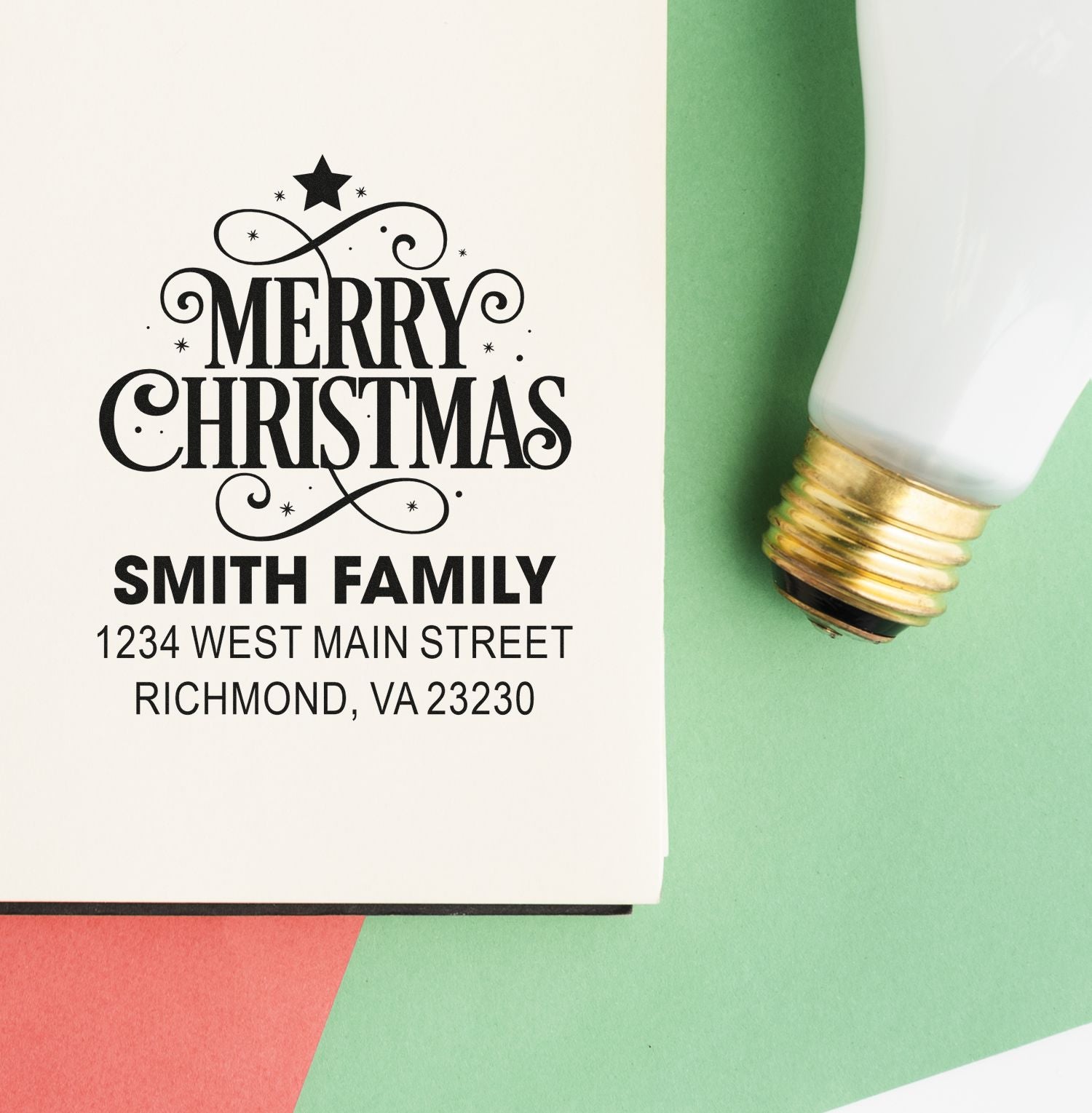 Personalized Merry Christmas rubber stamp with family name and address for holiday cards and envelopes.