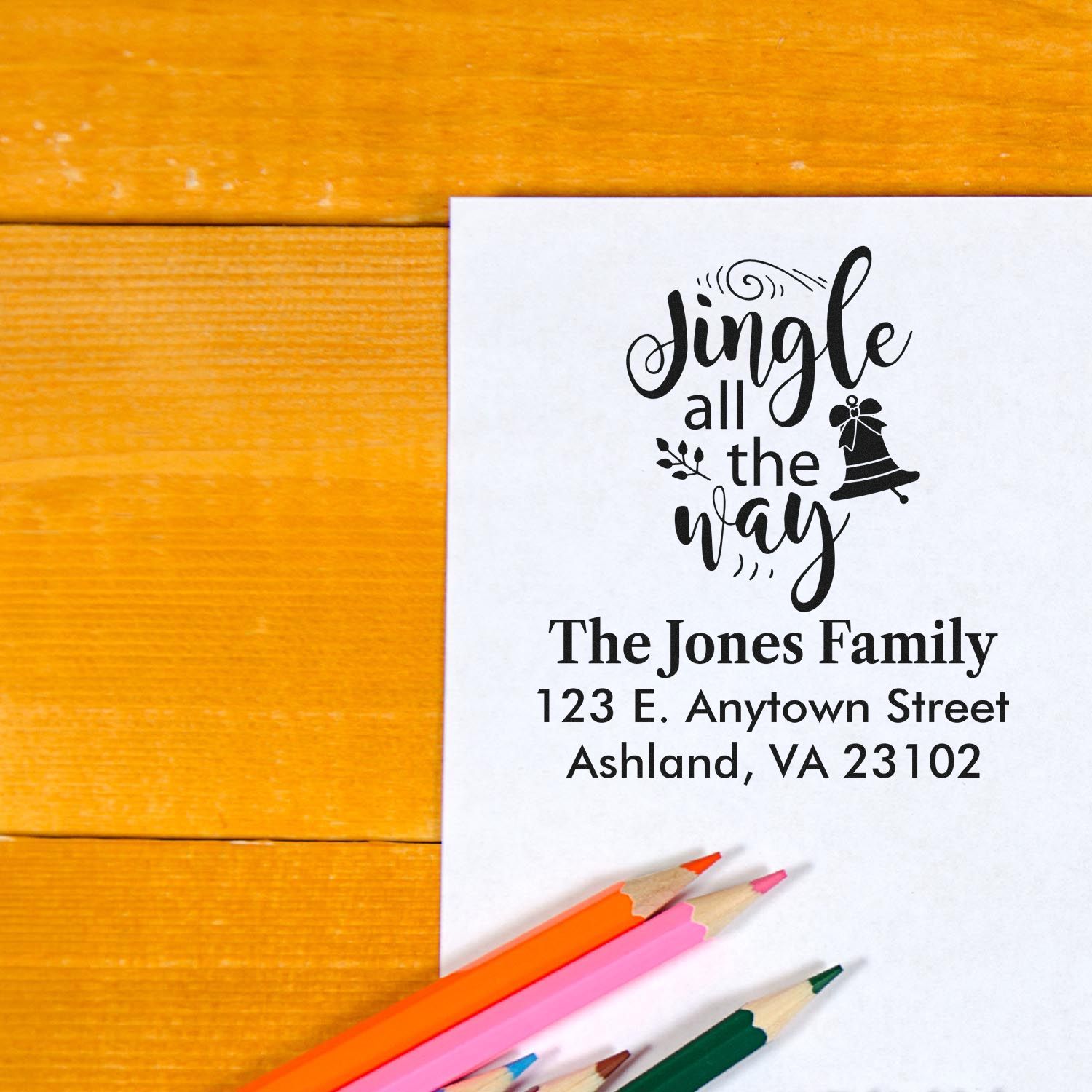 Personalized return address rubber stamp with festive Jingle all the way design for The Jones Family.