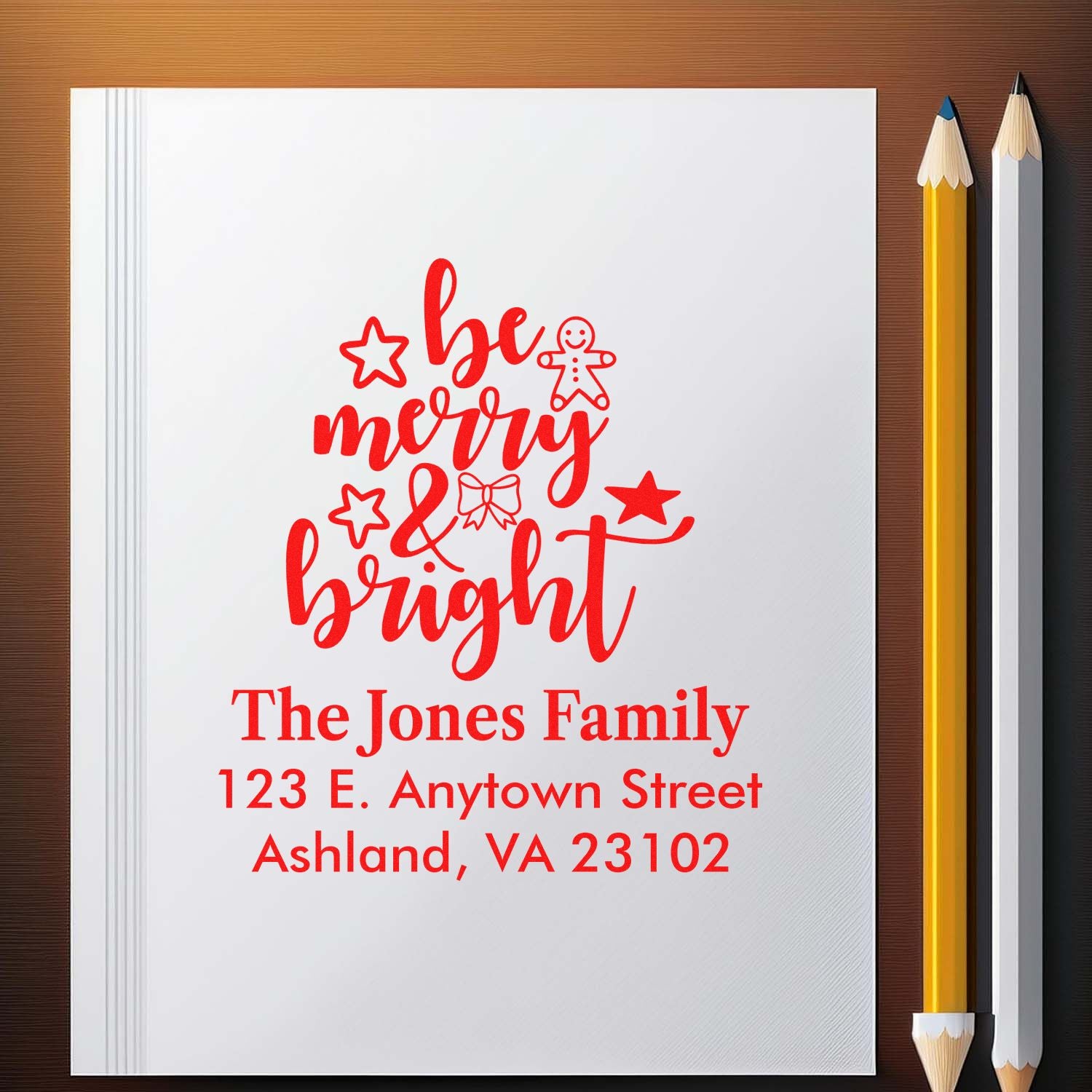 Personalized Christmas rubber stamp design with Be Merry & Bright, family name, and address for holiday cards.