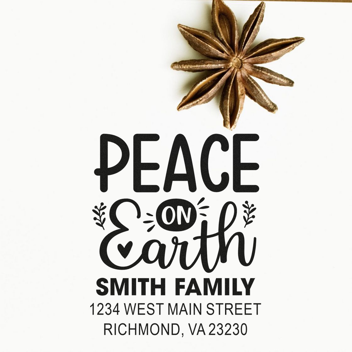 Custom rubber stamp design with Peace on Earth, Smith Family, and return address for holiday mailing.